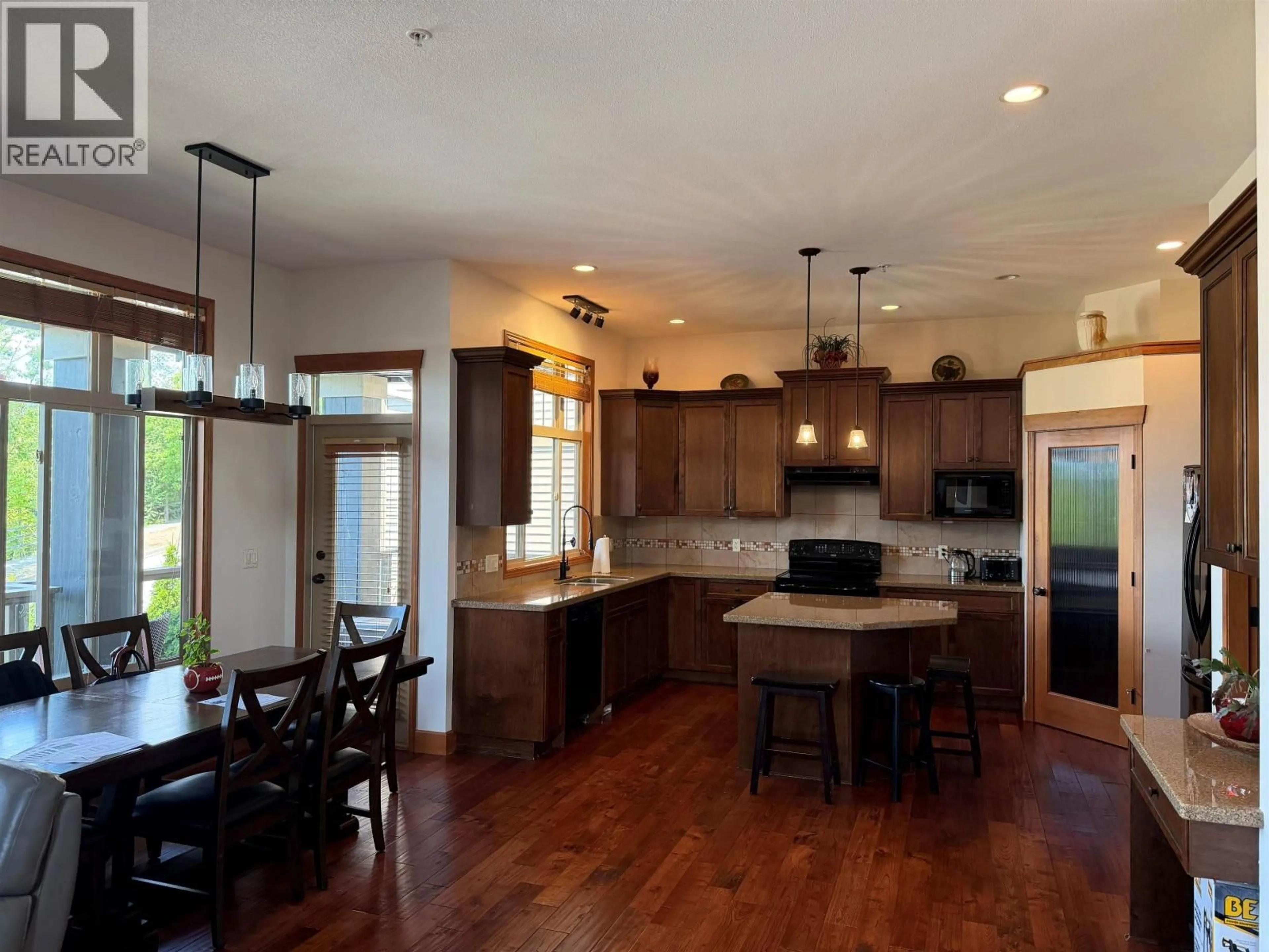 Open concept kitchen, wood/laminate floor for 22856 137 AVENUE, Maple Ridge British Columbia V4R0B6