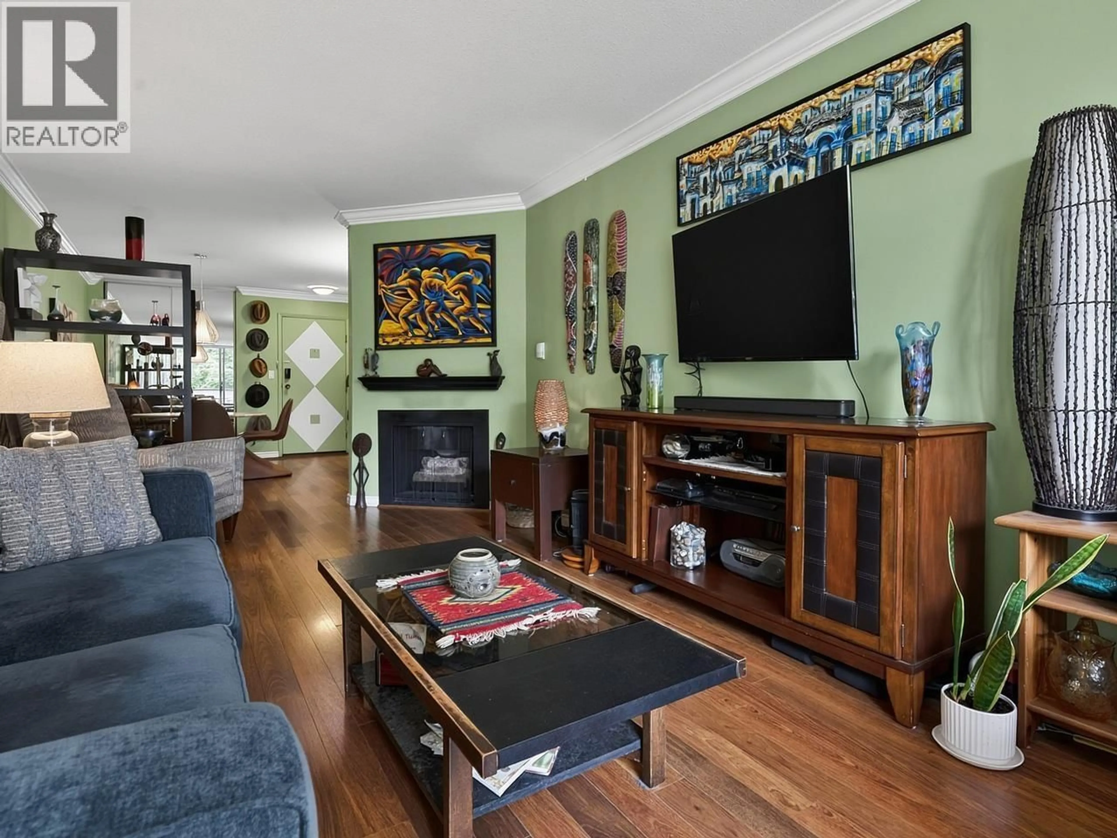 Living room with furniture, wood/laminate floor for 112 - 9151 NO 5 ROAD, Richmond British Columbia V7A4T9