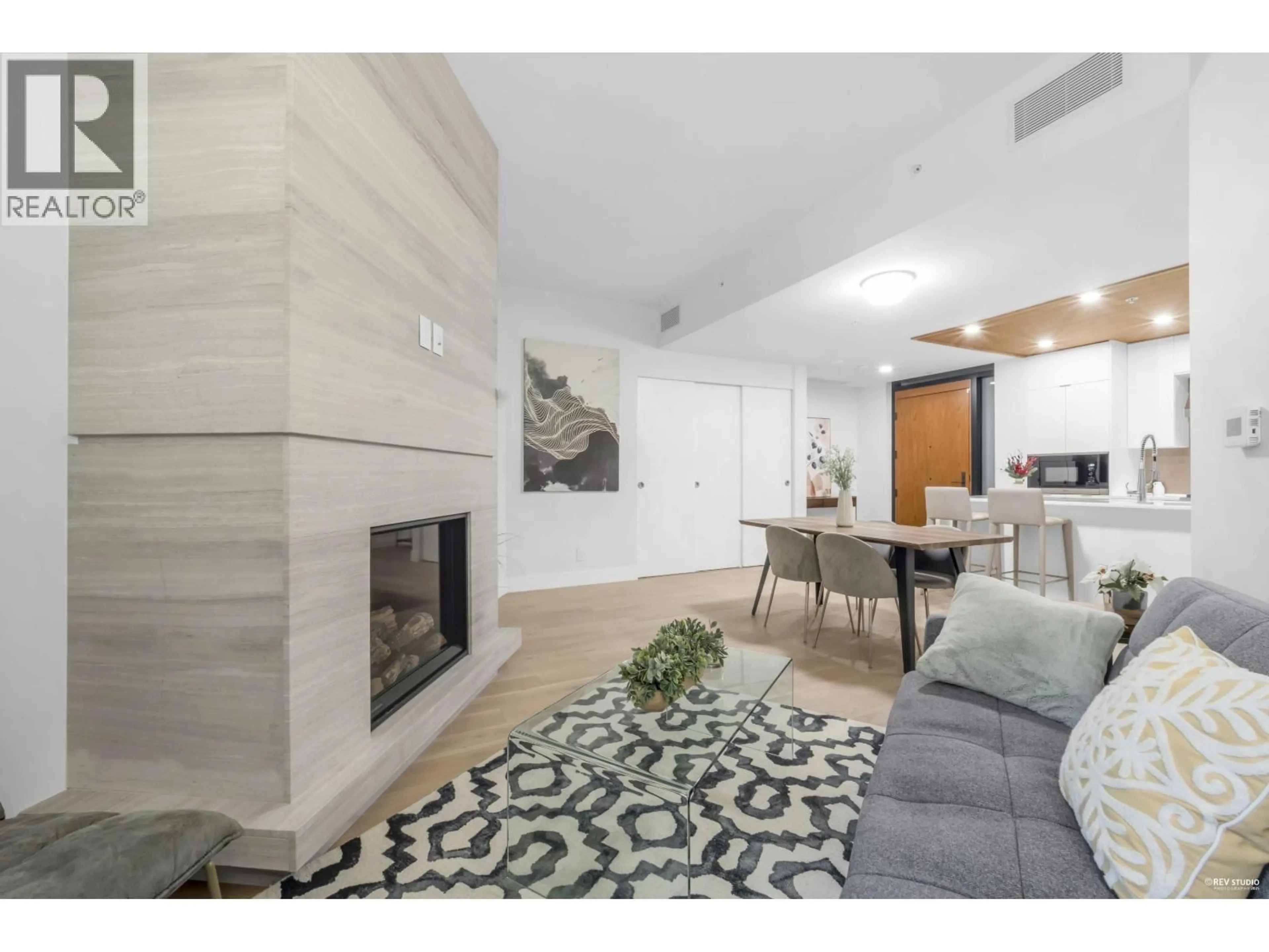 Living room with furniture, ceramic/tile floor for 101 - 6699 NELSON AVENUE, West Vancouver British Columbia V7W2B2