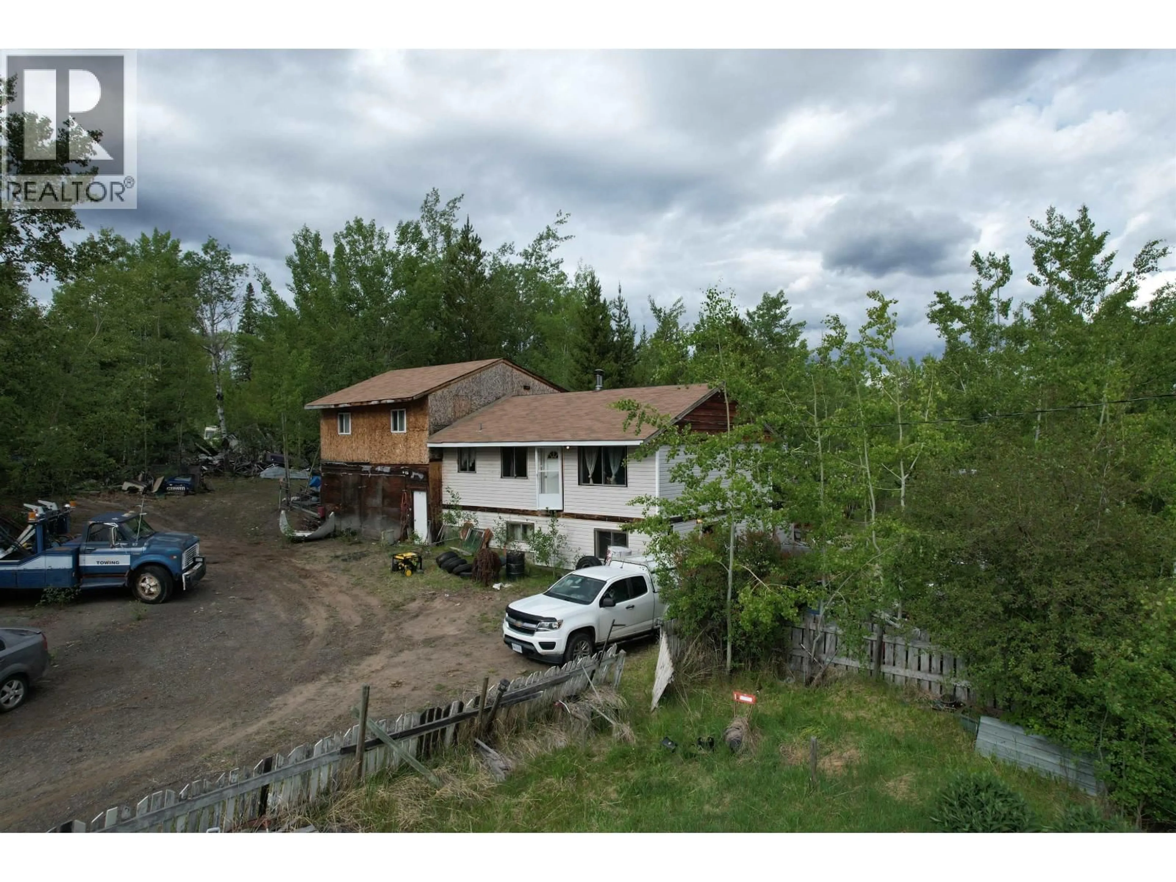 A pic from outside/outdoor area/front of a property/back of a property/a pic from drone, mountain view for 7285 90 MILE LOOP ROAD, 100 Mile House British Columbia V0K2E2