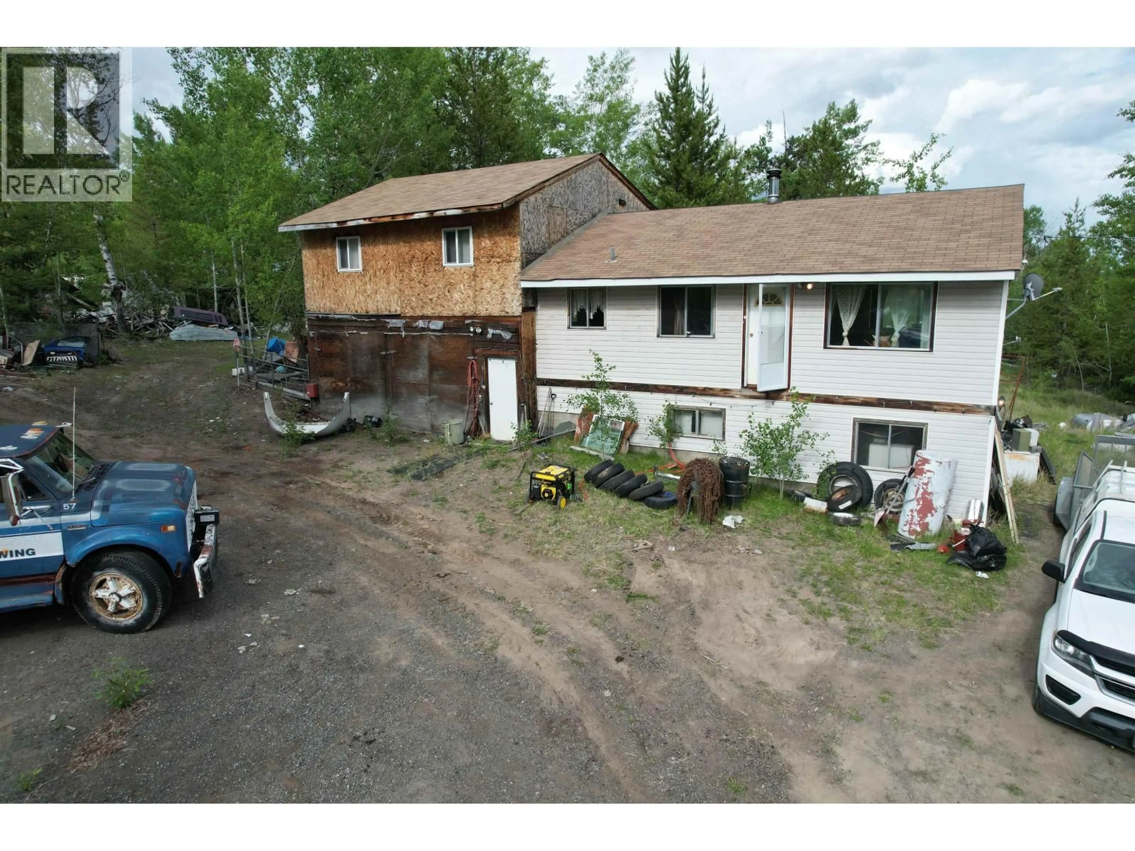A pic from outside/outdoor area/front of a property/back of a property/a pic from drone, building for 7285 90 MILE LOOP ROAD, 100 Mile House British Columbia V0K2E2