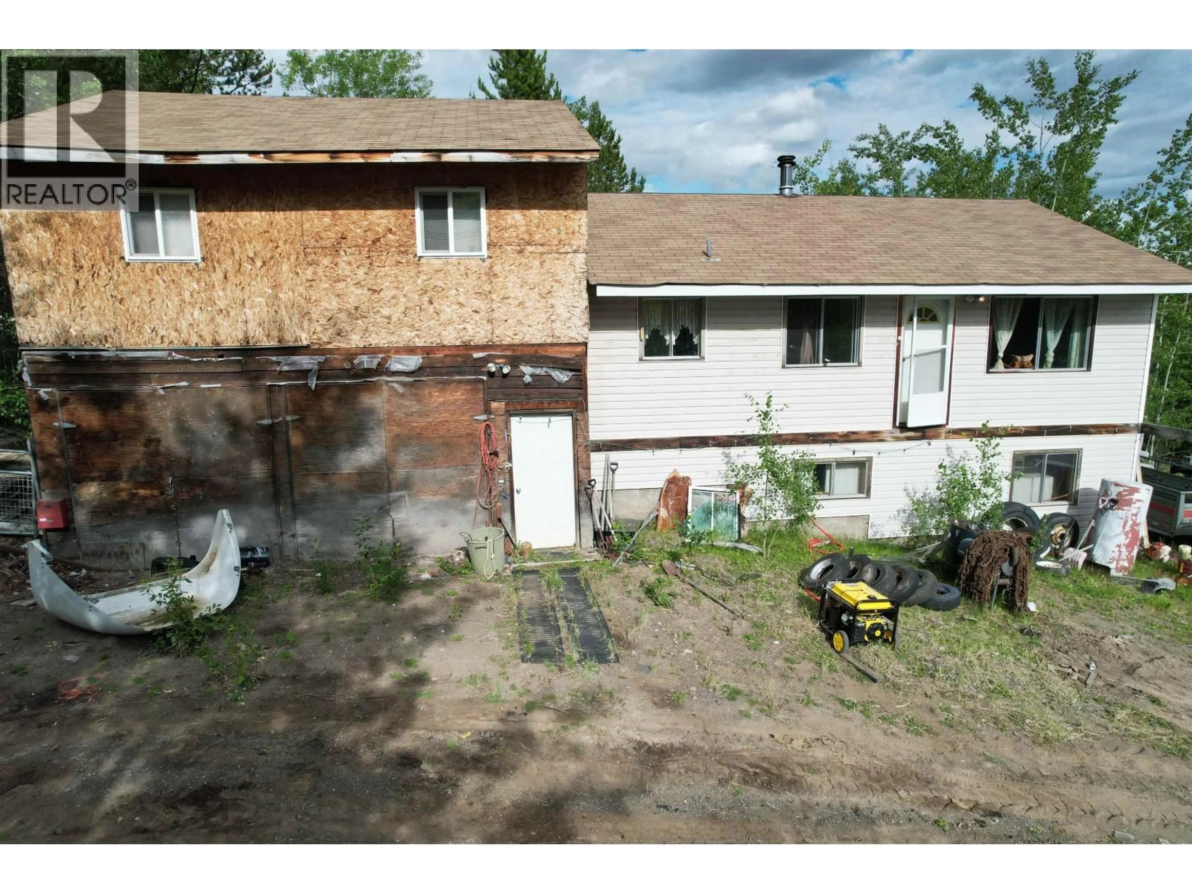 A pic from outside/outdoor area/front of a property/back of a property/a pic from drone, building for 7285 90 MILE LOOP ROAD, 100 Mile House British Columbia V0K2E2
