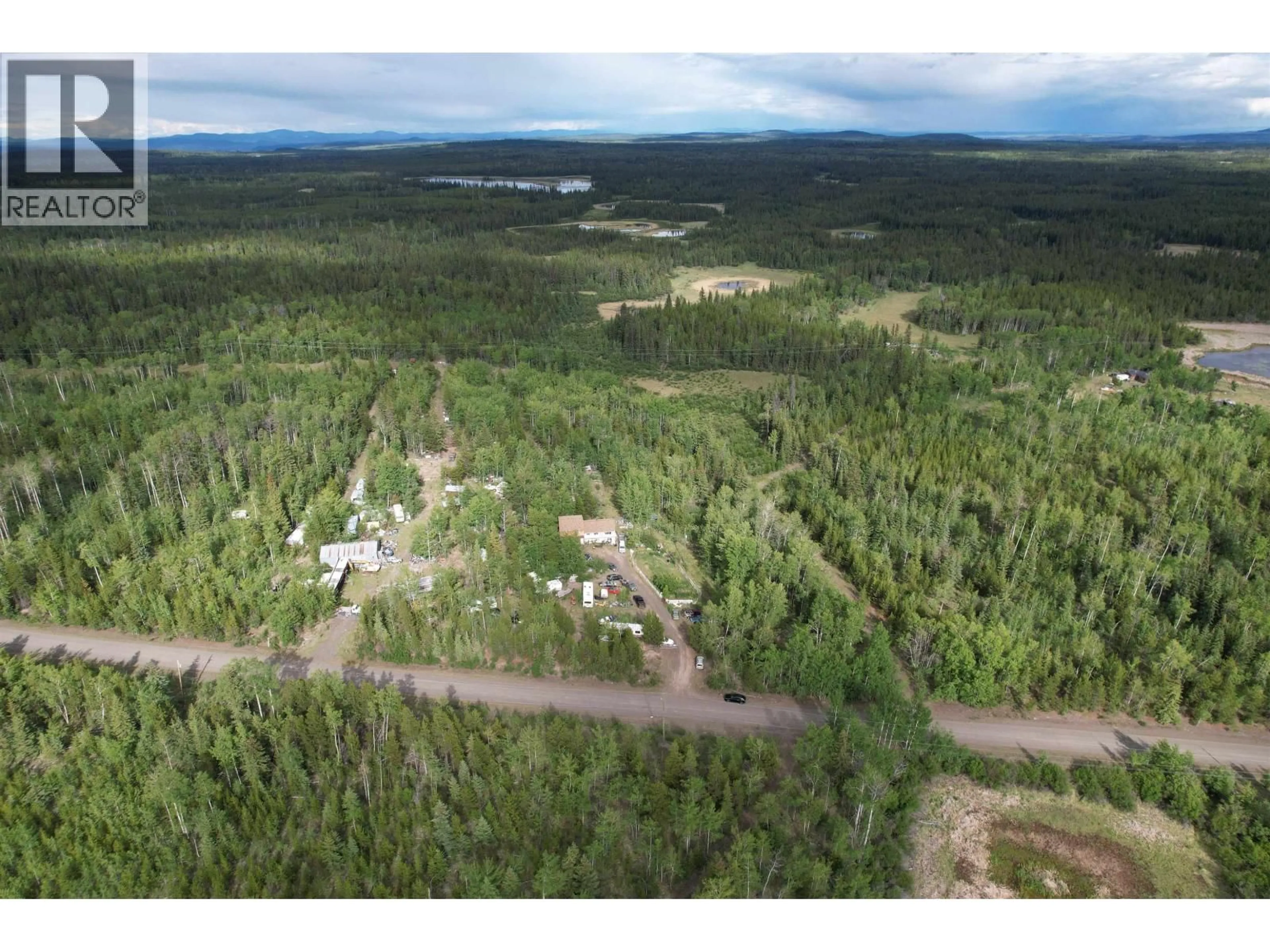 A pic from outside/outdoor area/front of a property/back of a property/a pic from drone, forest/trees view for 7285 90 MILE LOOP ROAD, 100 Mile House British Columbia V0K2E2