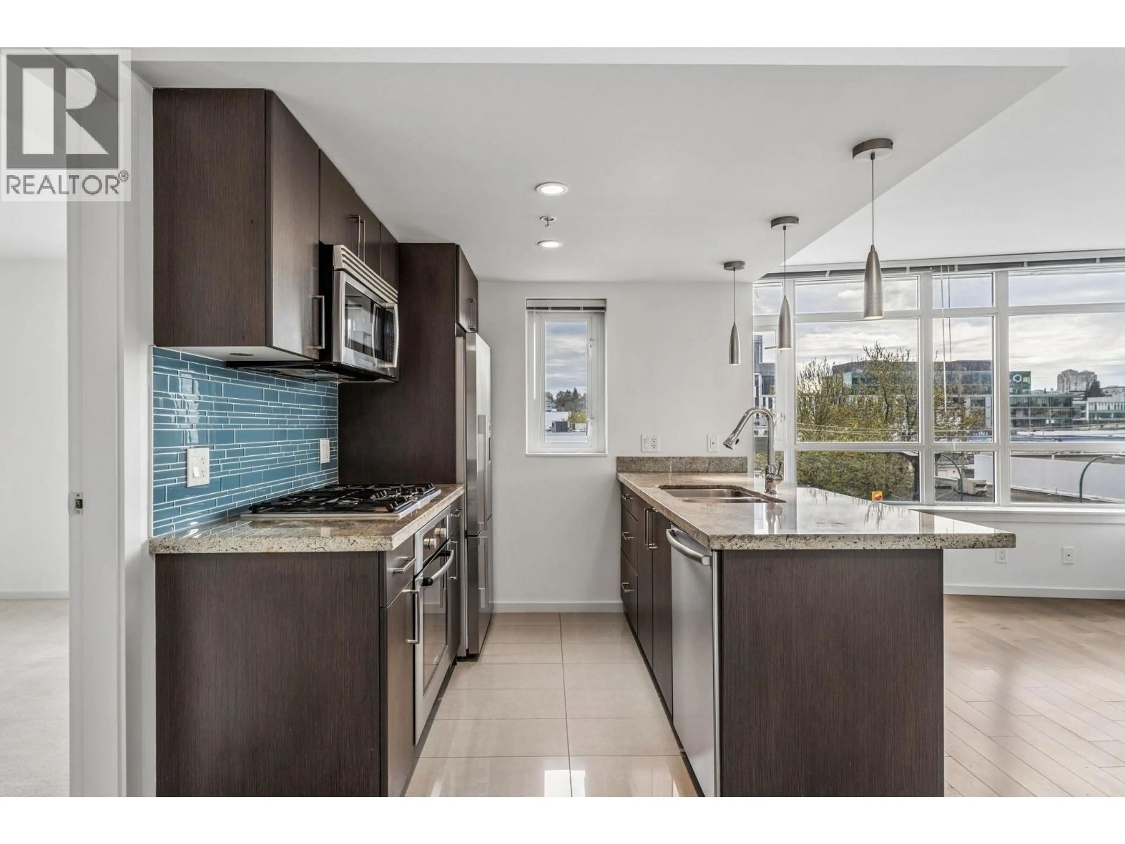 Open concept kitchen, ceramic/tile floor for 503 - 89 2ND AVENUE, Vancouver British Columbia V5Y0G9