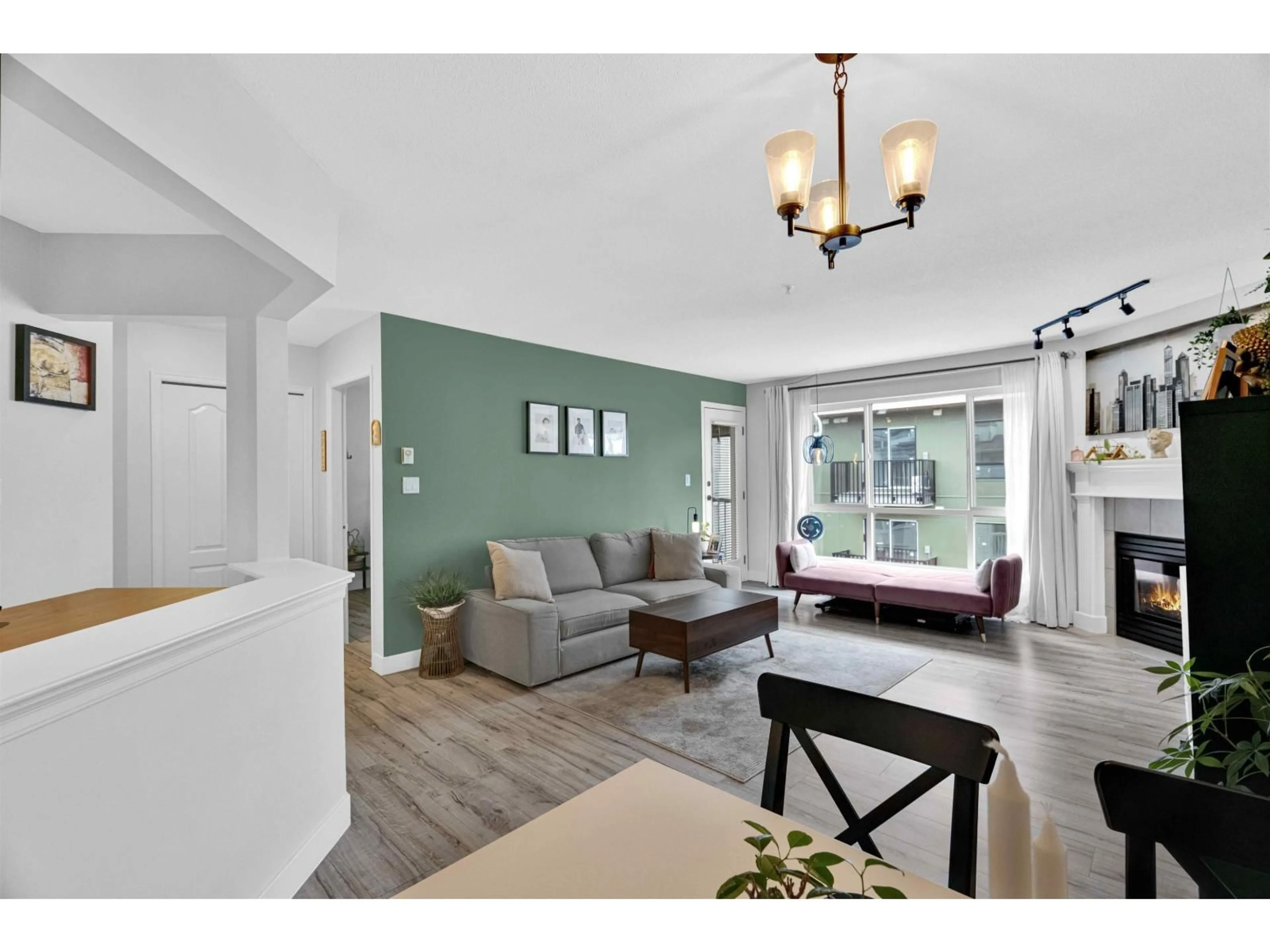 Living room with furniture, unknown for 405 - 20200 54A AVENUE, Langley British Columbia V3A3W7