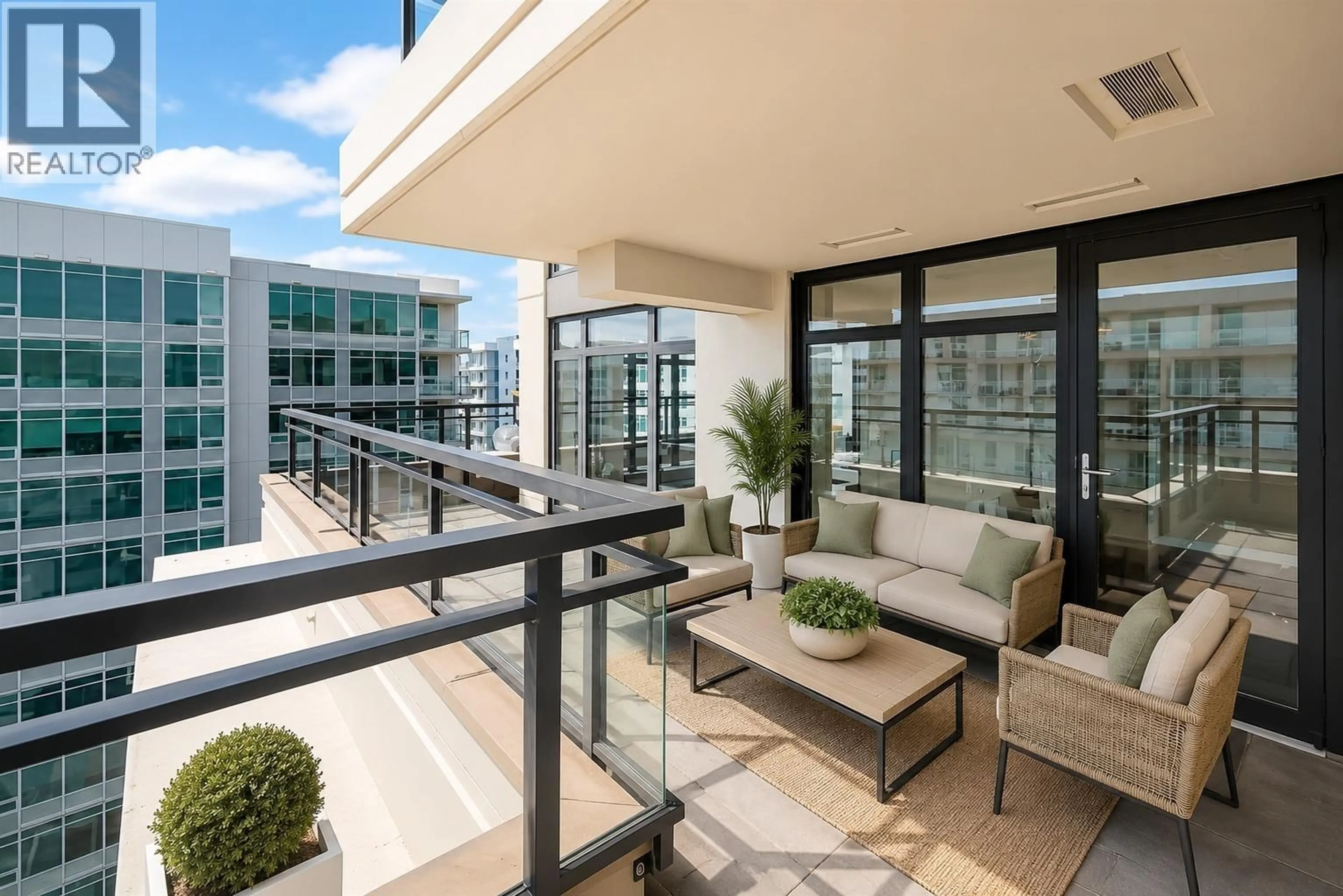Patio, city buildings view from balcony for 1703 - 6351 BUSWELL STREET, Richmond British Columbia V6Y0A4