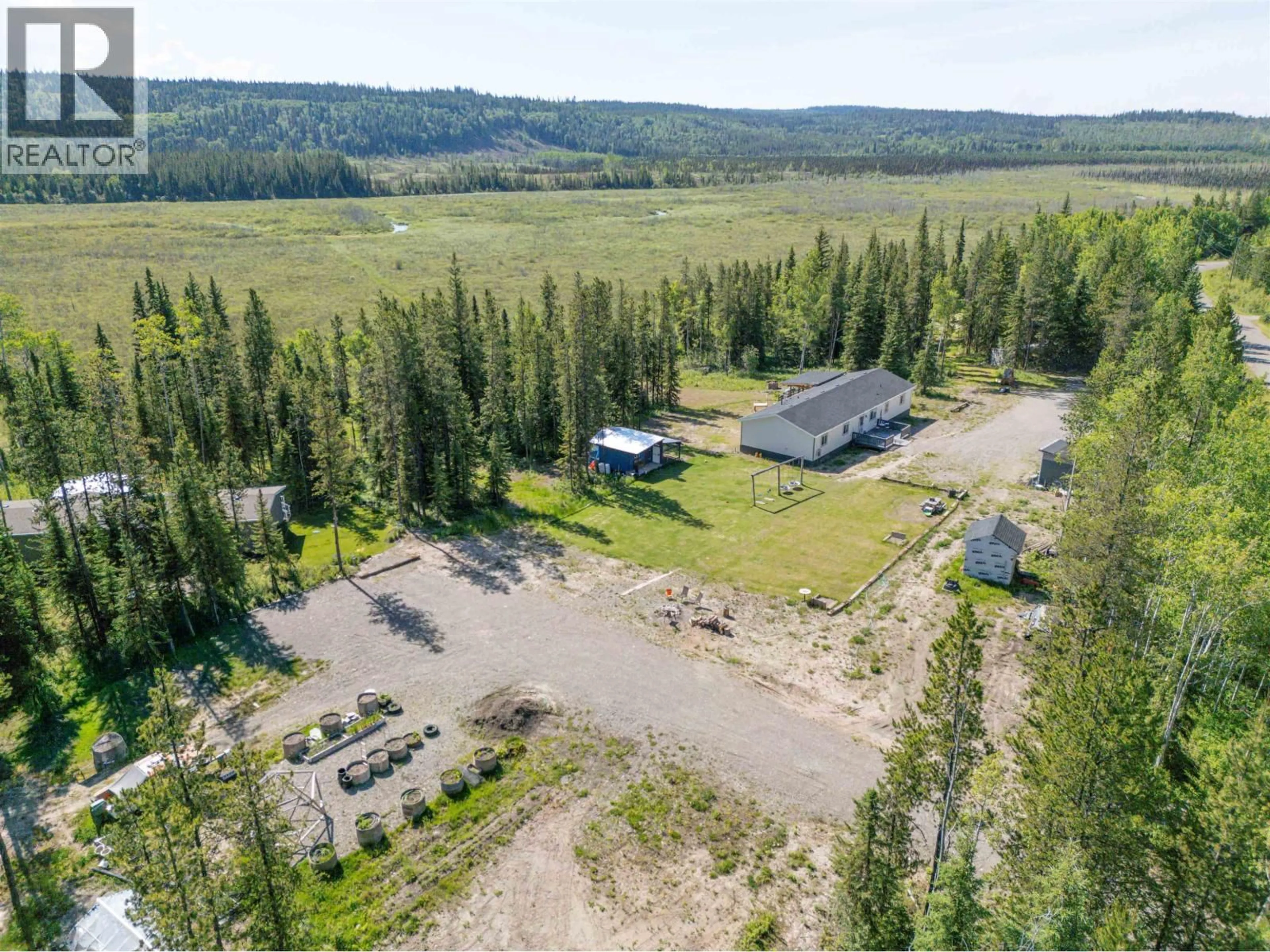 A pic from outside/outdoor area/front of a property/back of a property/a pic from drone, unknown for 18710 HUGHES ROAD, Prince George British Columbia V2N6S2