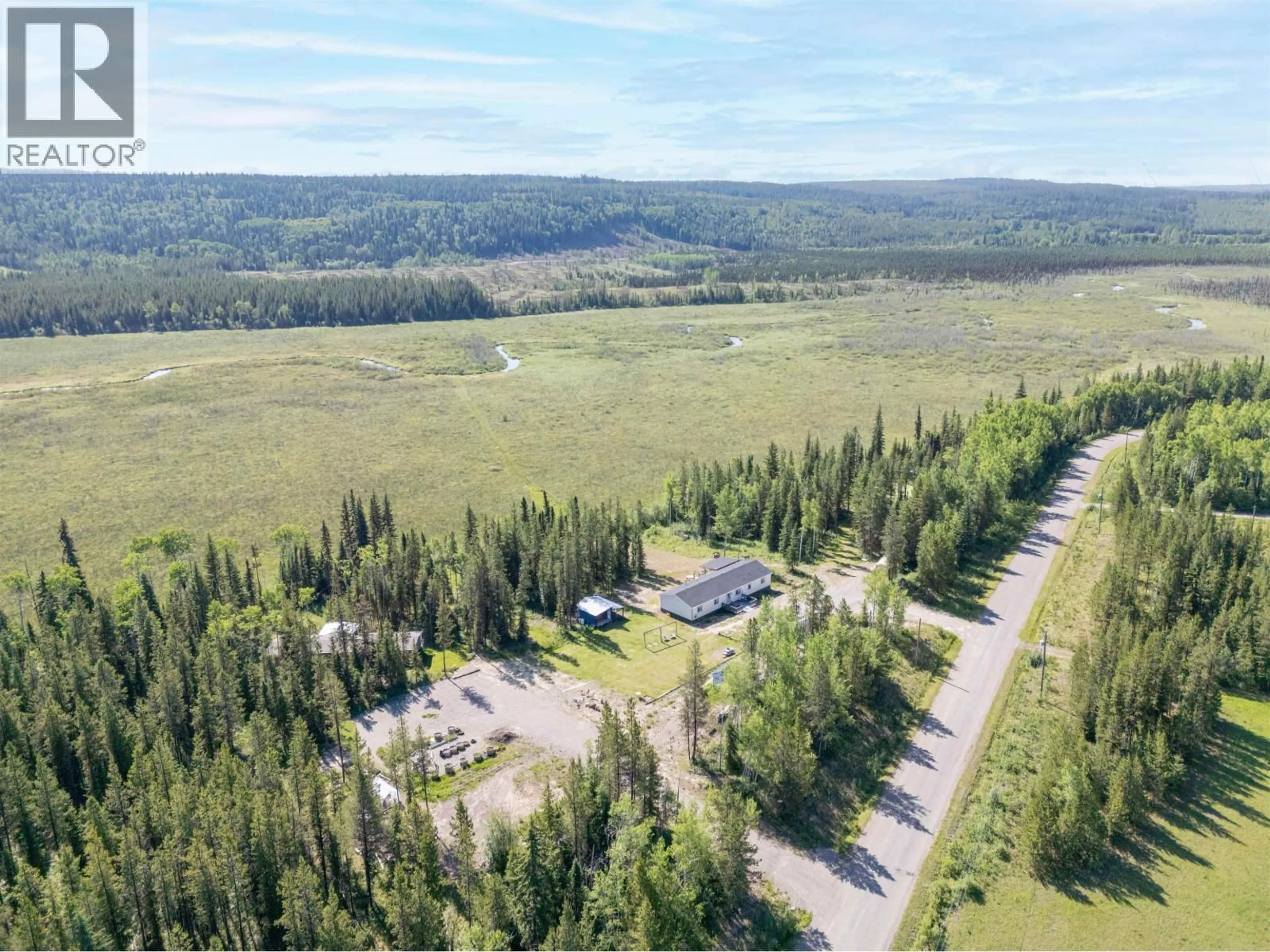 A pic from outside/outdoor area/front of a property/back of a property/a pic from drone, forest/trees view for 18710 HUGHES ROAD, Prince George British Columbia V2N6S2