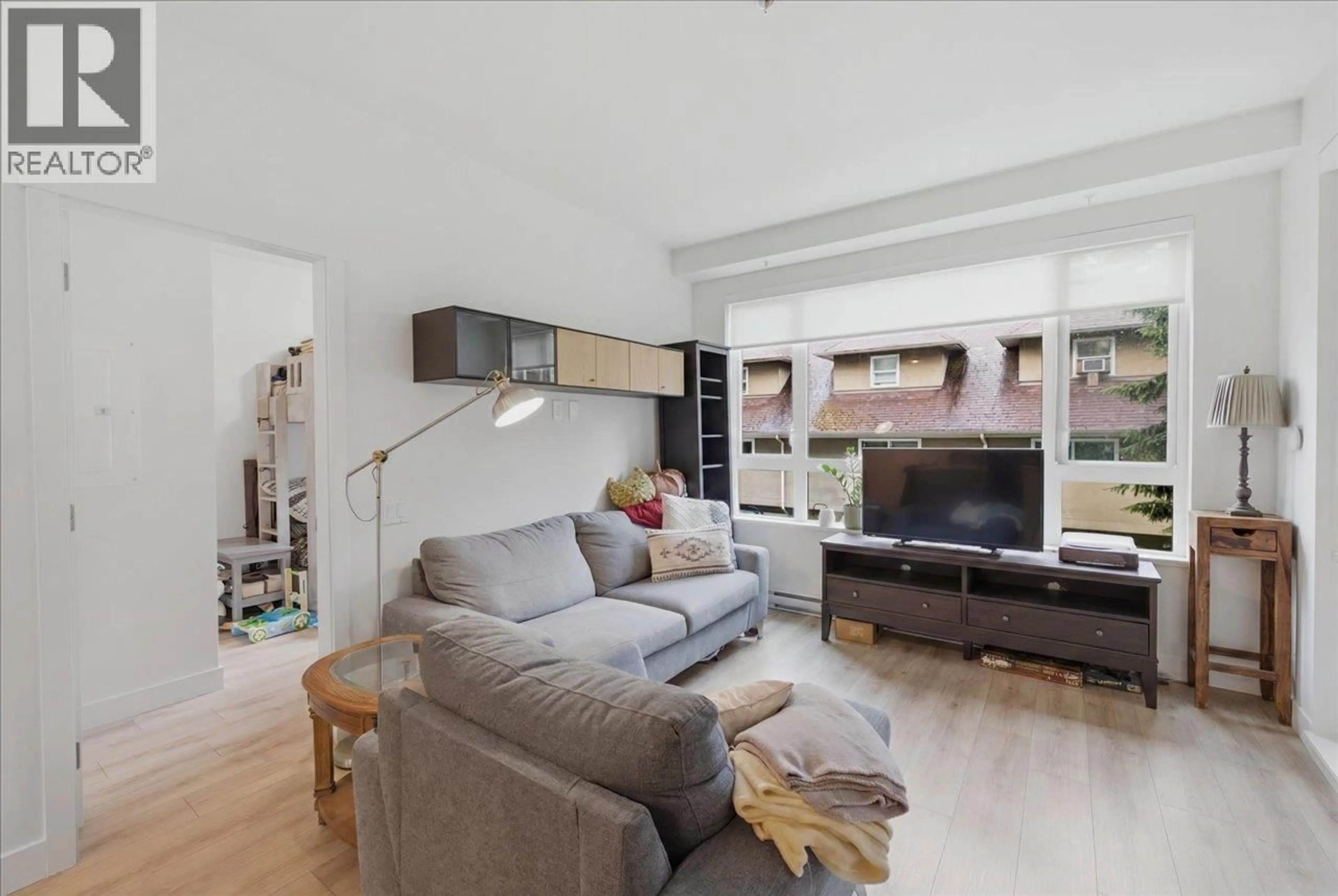Living room with furniture, unknown for 214 - 741 ANSKAR COURT, Coquitlam British Columbia V3J0N3
