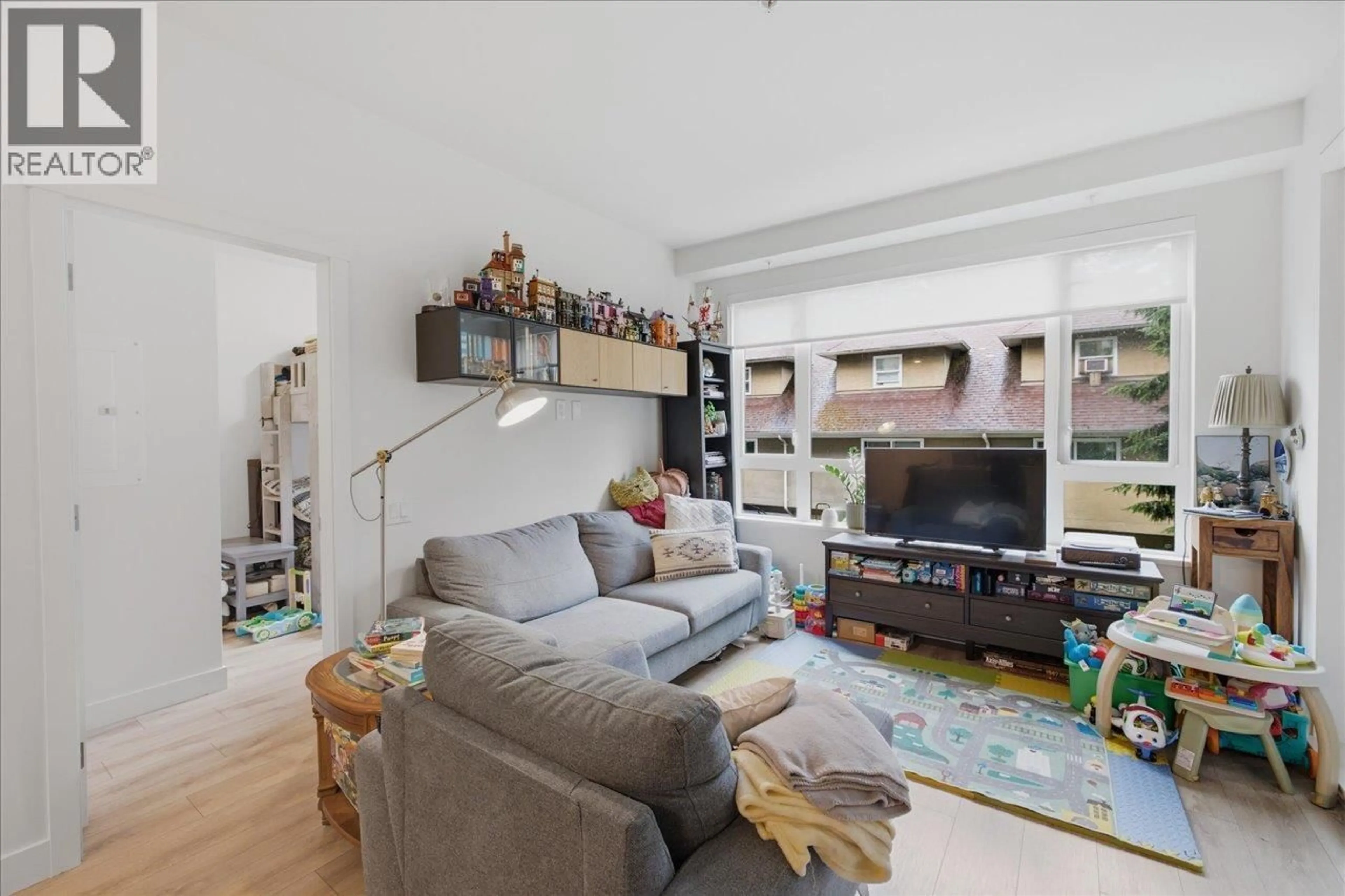 Living room with furniture, unknown for 214 - 741 ANSKAR COURT, Coquitlam British Columbia V3J0N3