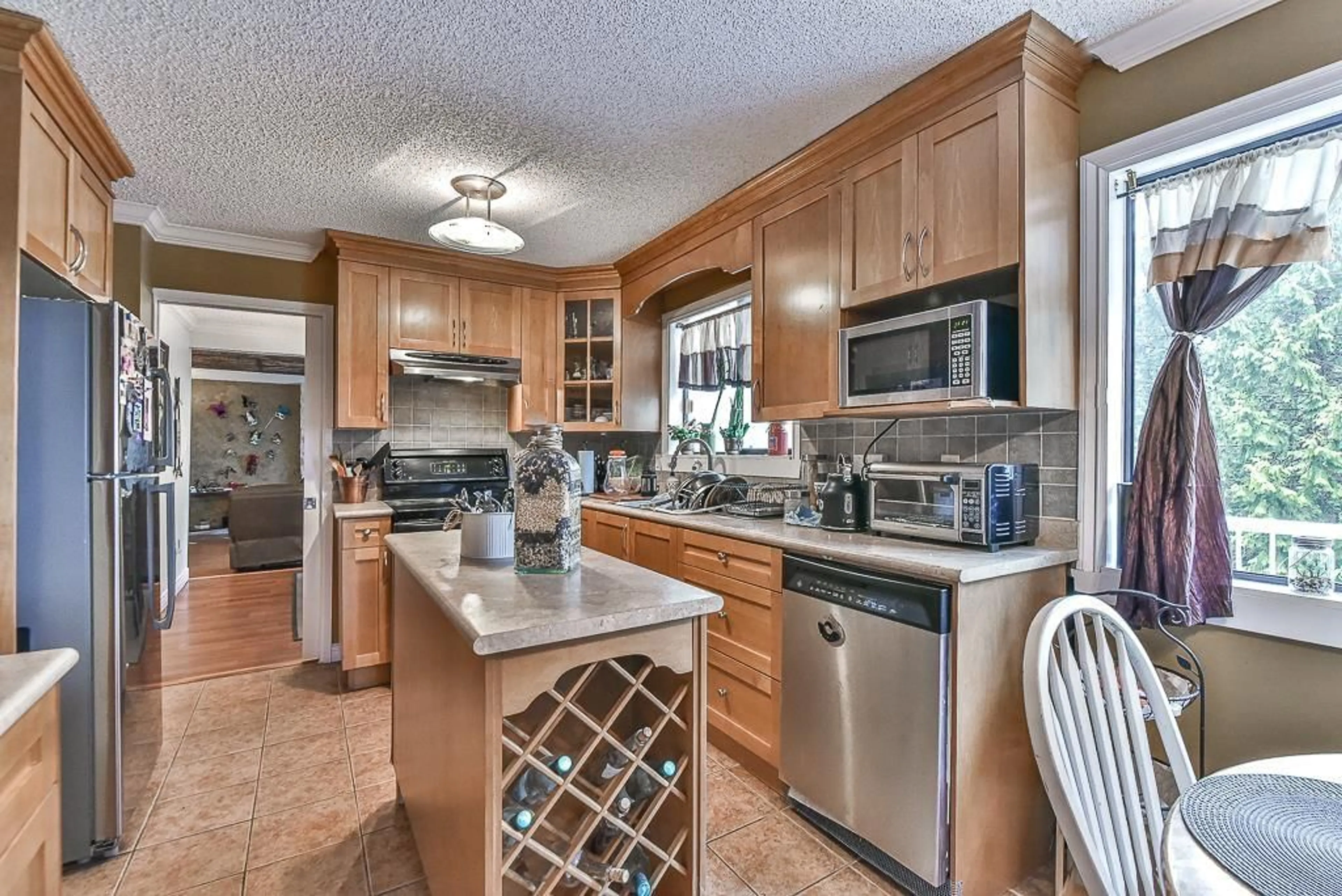 Open concept kitchen, ceramic/tile floor for 13243 COULTHARD ROAD, Surrey British Columbia V3X3E5