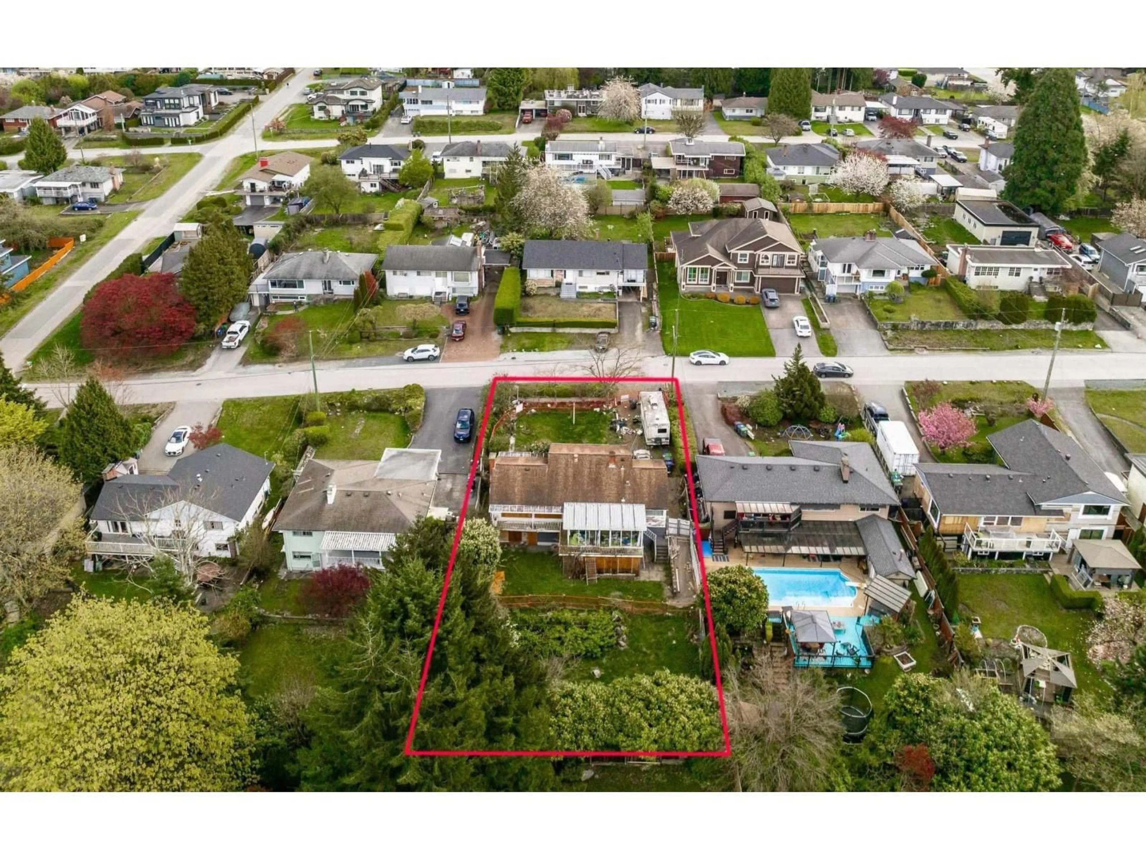 A pic from outside/outdoor area/front of a property/back of a property/a pic from drone, street for 10259 124A STREET, Surrey British Columbia V3V4W7