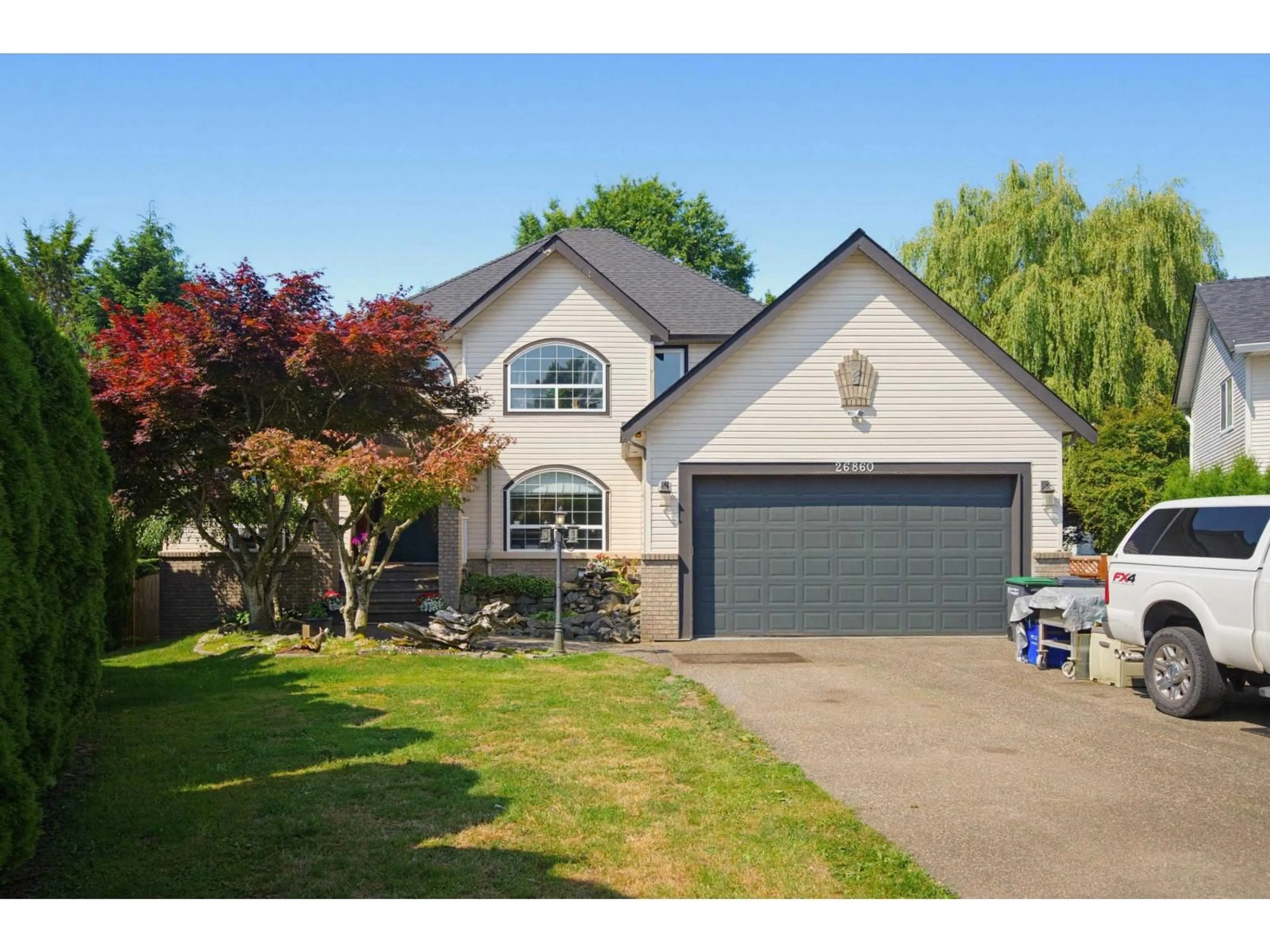 Home with vinyl exterior material, street for 26860 24A AVENUE, Langley British Columbia V4W3W6