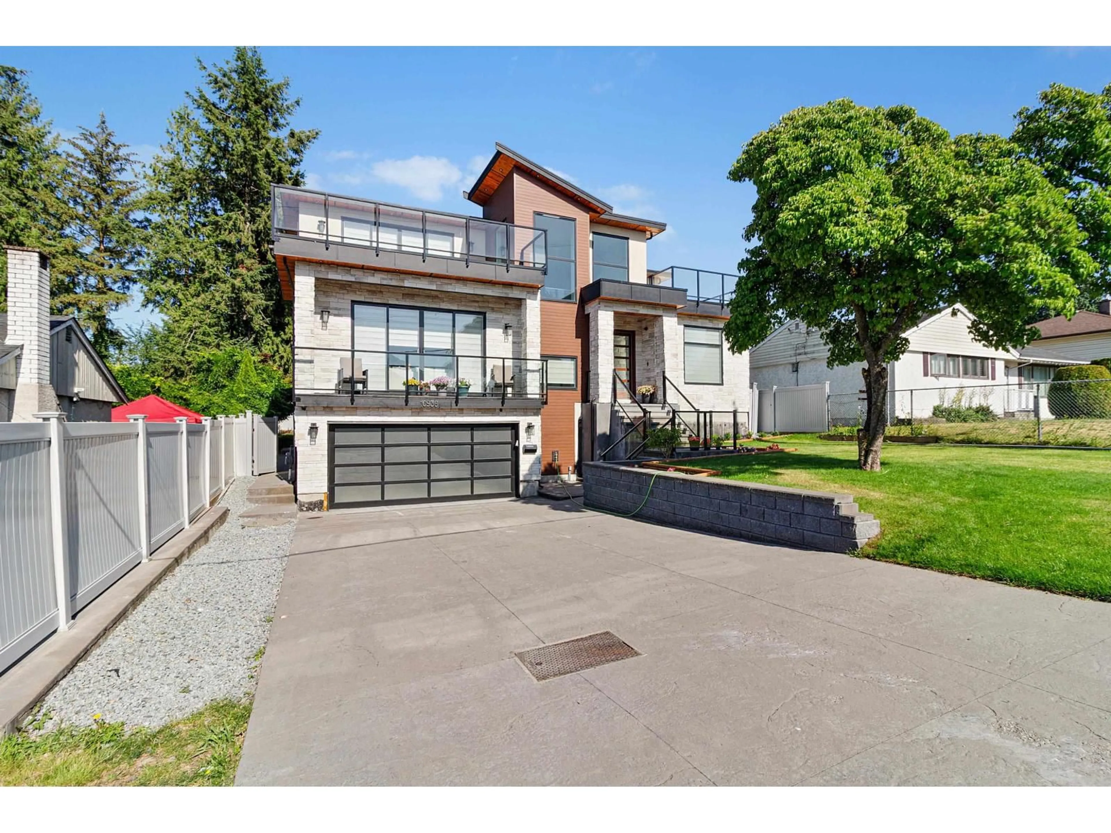 Home with brick exterior material, street for 10936 128A STREET, Surrey British Columbia V3T3G2