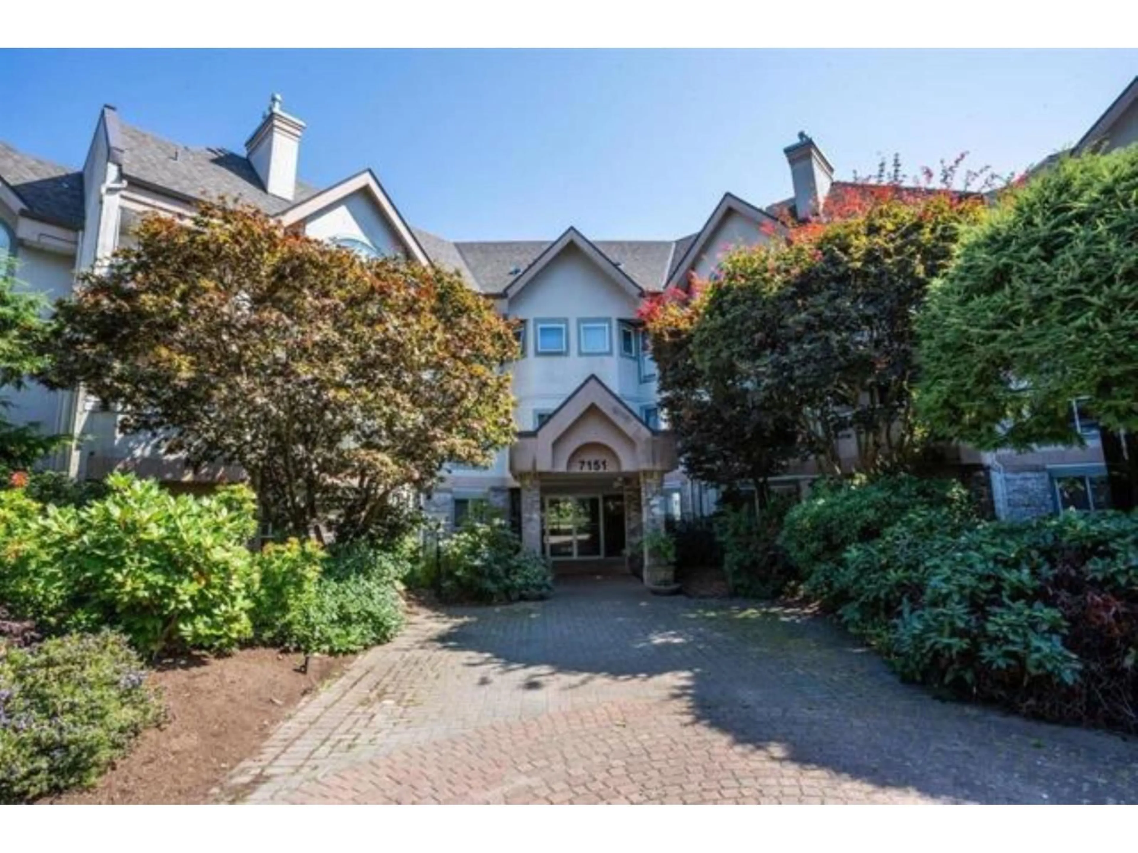 A pic from outside/outdoor area/front of a property/back of a property/a pic from drone, street for 301 - 7151 121 STREET SOUTH, Surrey British Columbia V3W0E7