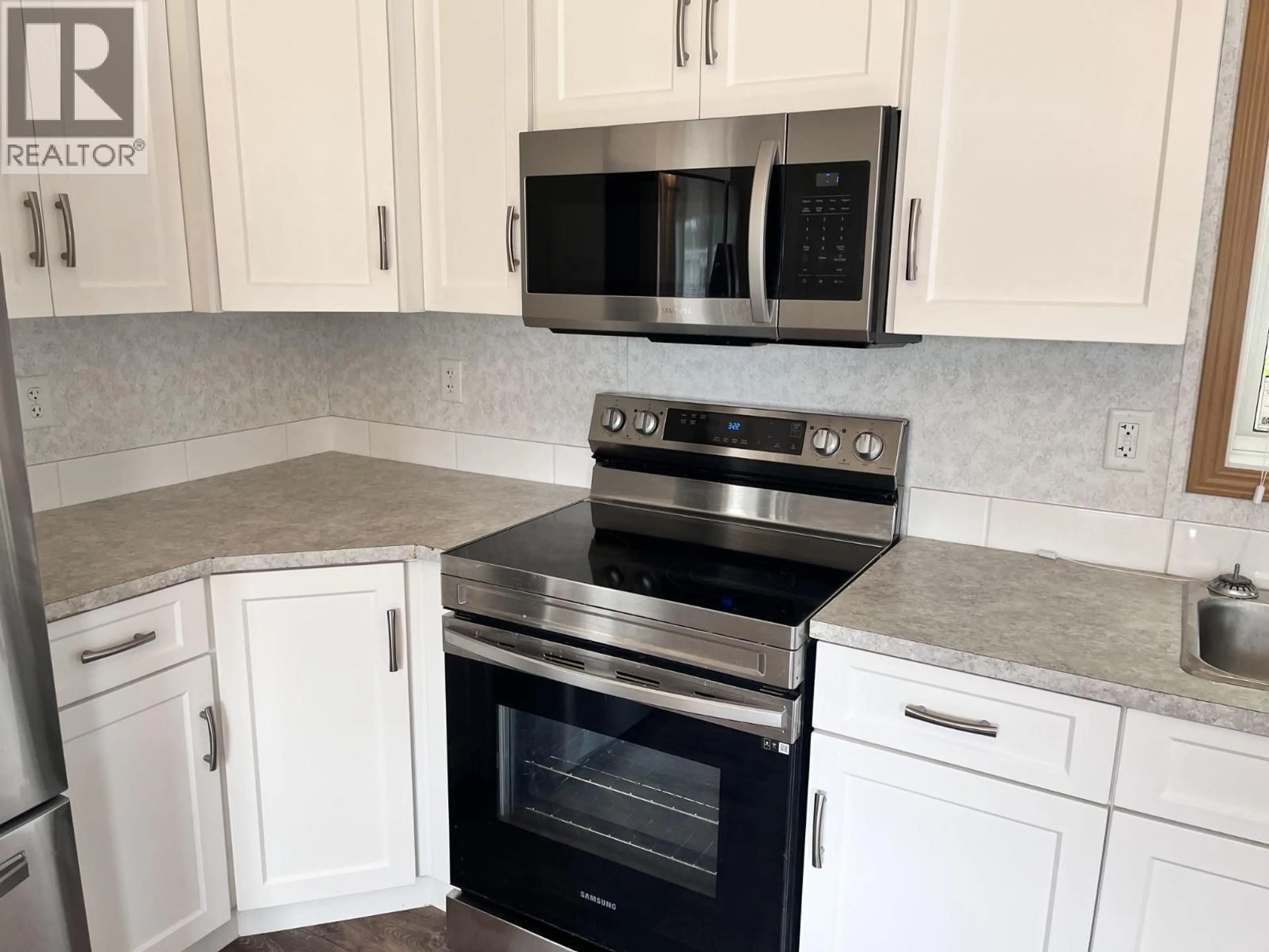 Standard kitchen, ceramic/tile floor for 61 - 634 ELM STREET, Quesnel British Columbia V2J3X1