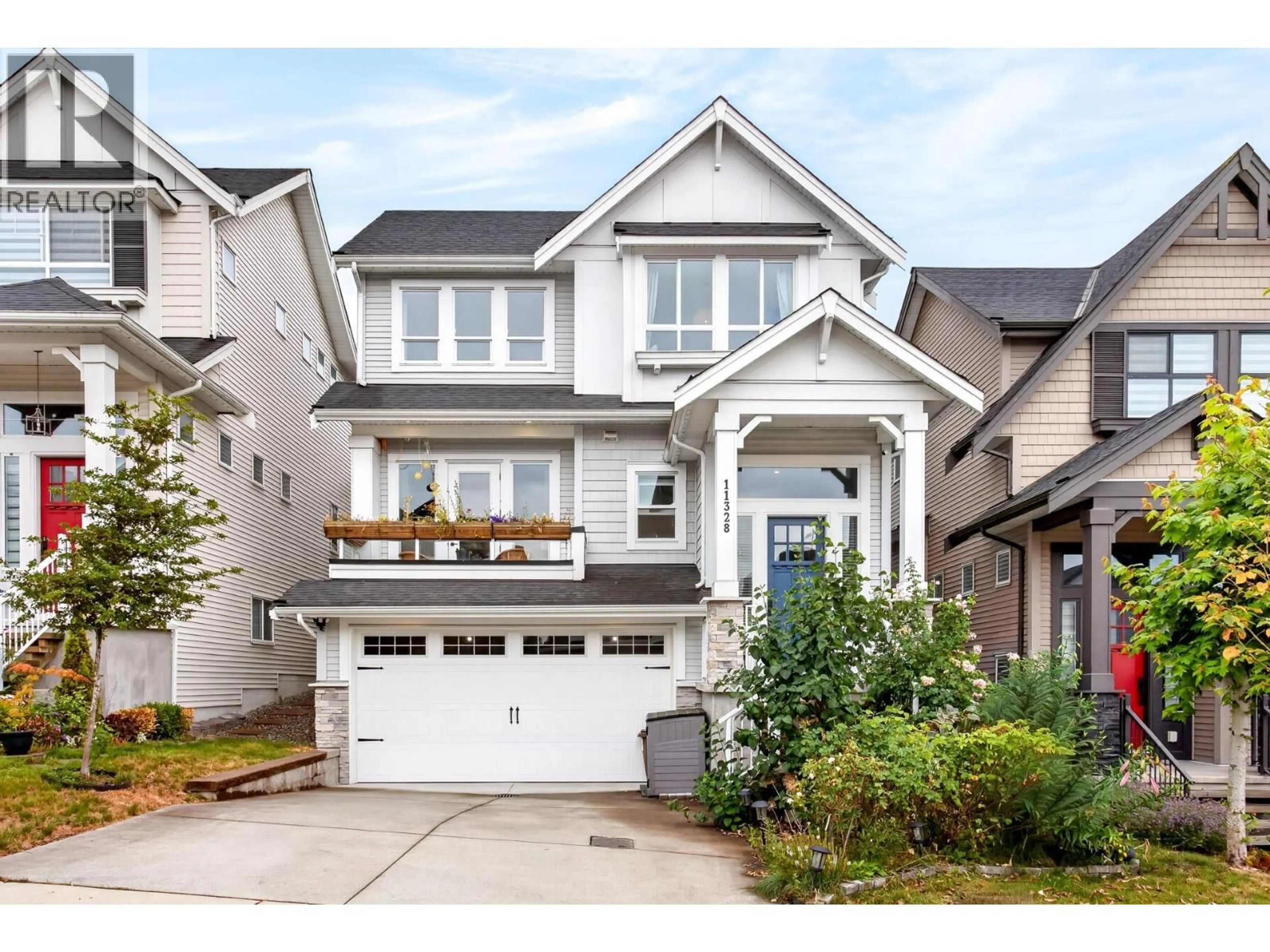 Home with vinyl exterior material, street for 11328 230 STREET, Maple Ridge British Columbia V2X9S6