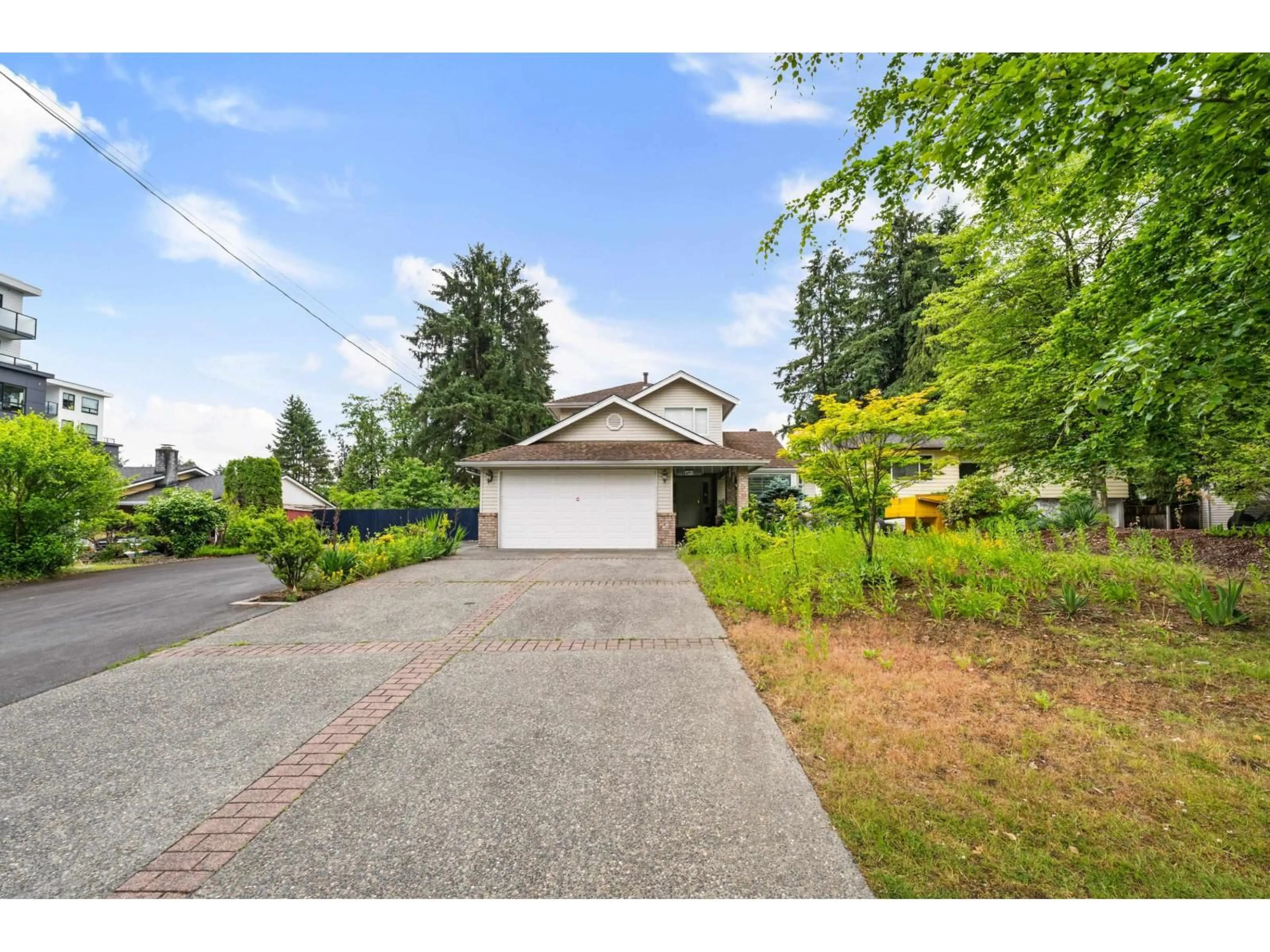 A pic from outside/outdoor area/front of a property/back of a property/a pic from drone, street for 14710 106 AVENUE, Surrey British Columbia V3R5Y1