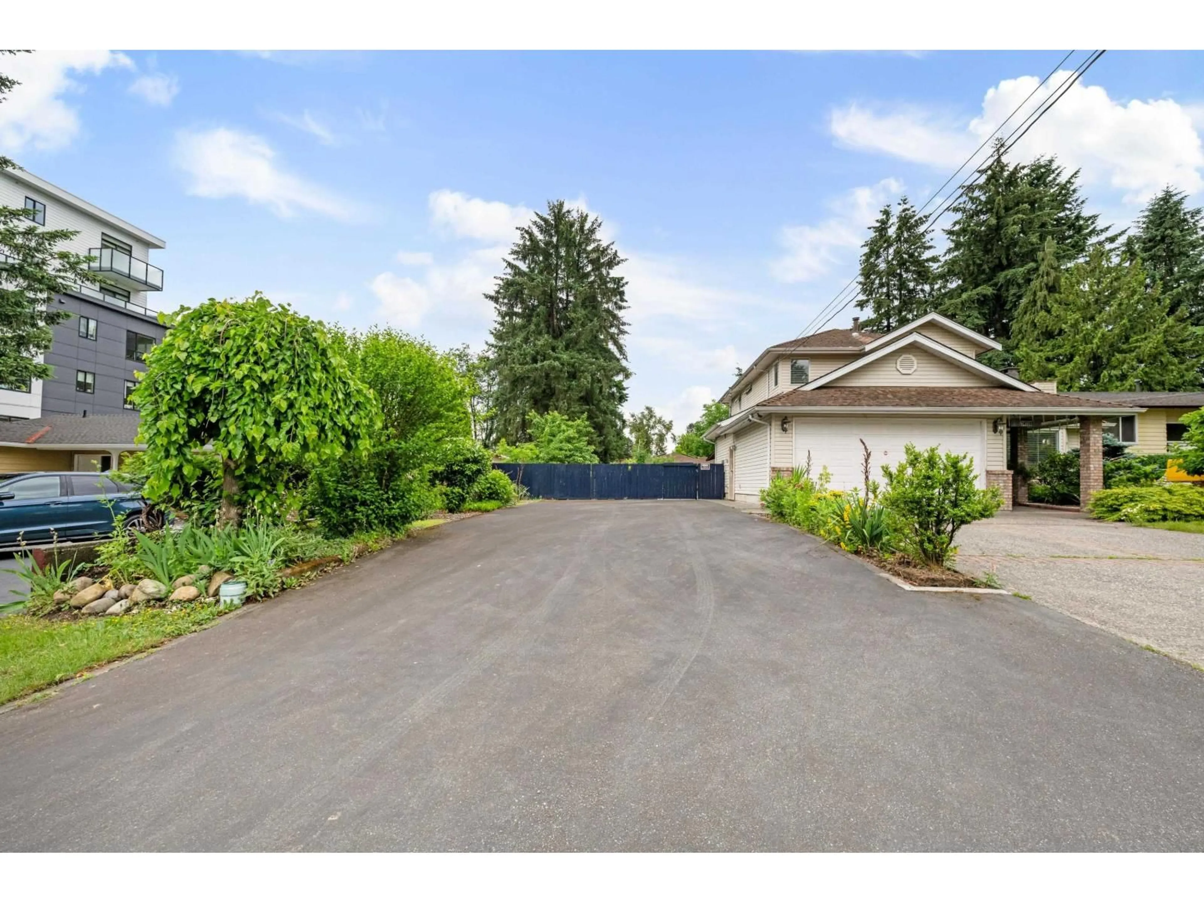 A pic from outside/outdoor area/front of a property/back of a property/a pic from drone, street for 14710 106 AVENUE, Surrey British Columbia V3R5Y1