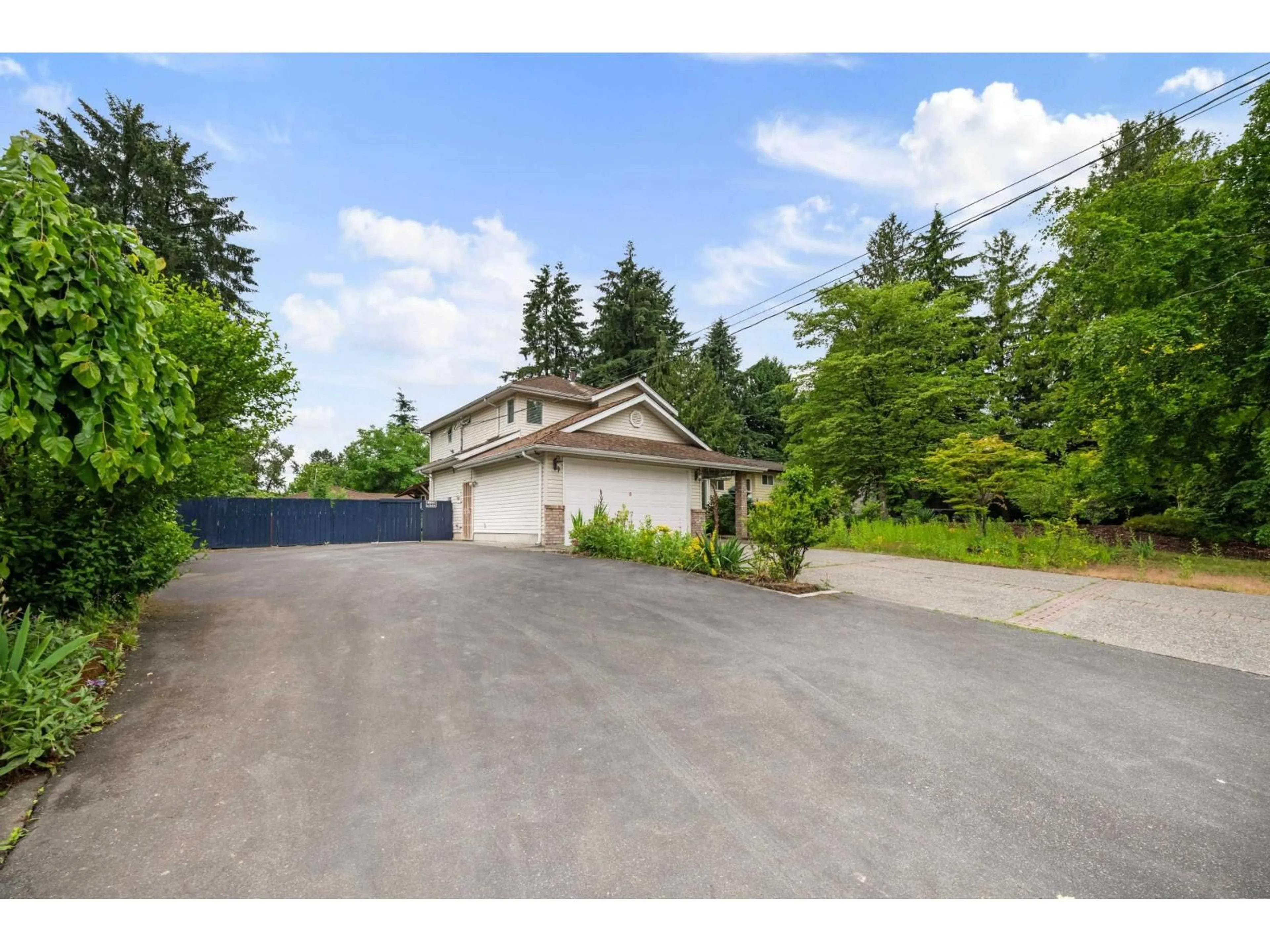 A pic from outside/outdoor area/front of a property/back of a property/a pic from drone, street for 14710 106 AVENUE, Surrey British Columbia V3R5Y1