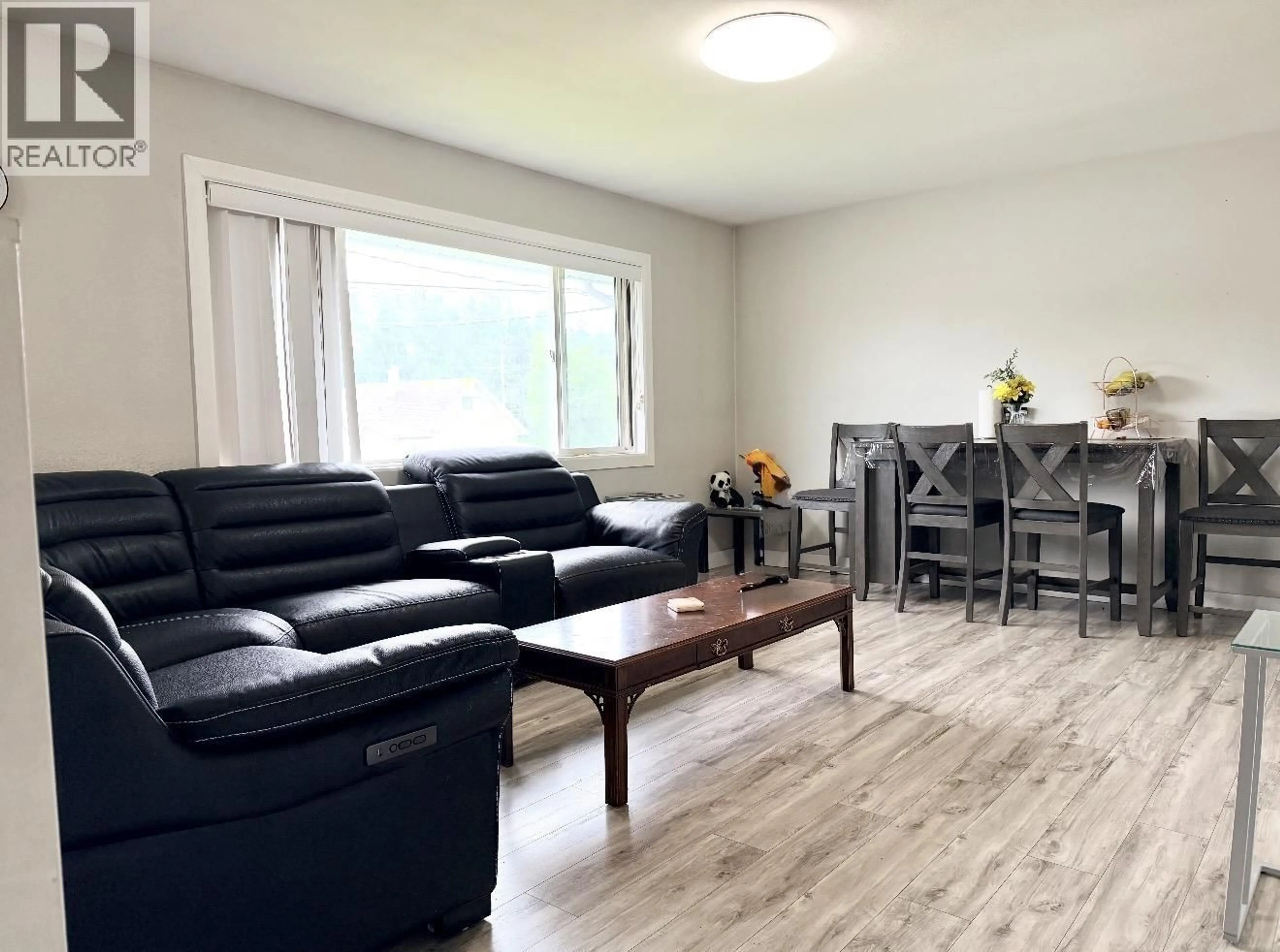 Living room with furniture, wood/laminate floor for 14 GANNET CRESCENT, Kitimat British Columbia V8C1P3