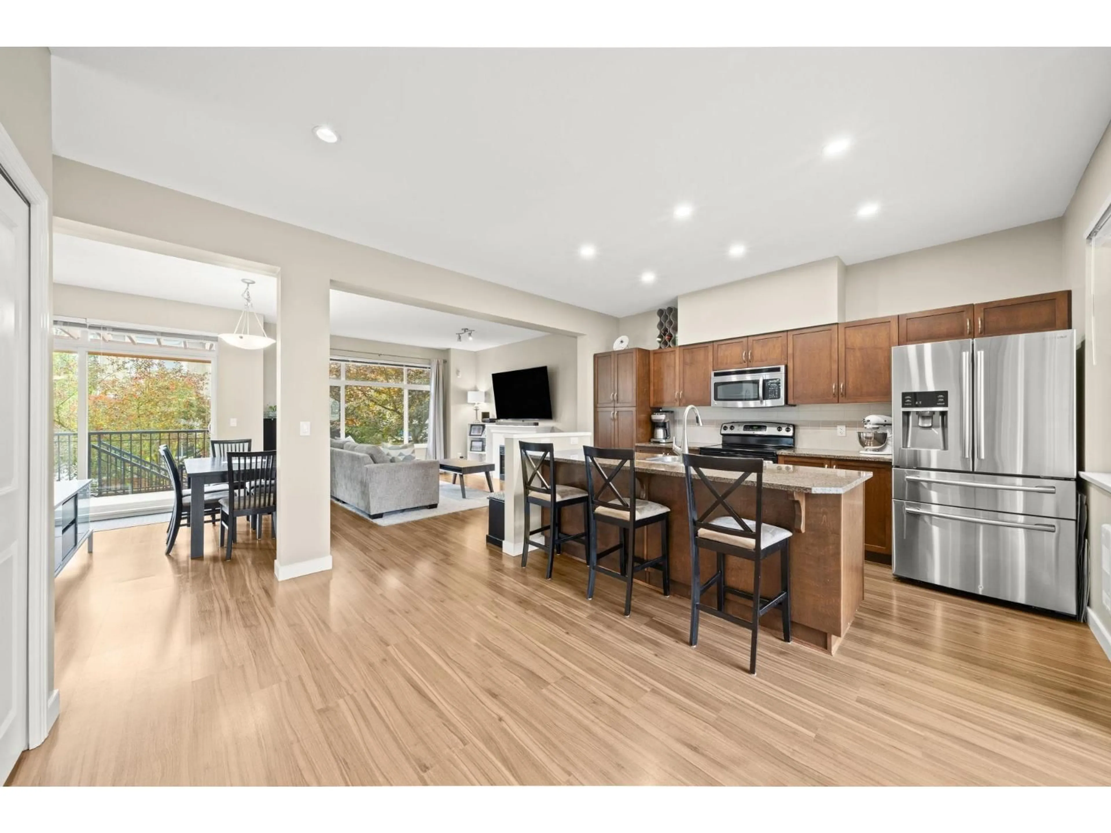 Open concept kitchen, wood/laminate floor for 20 - 6036 164 STREET, Surrey British Columbia V3S3Y5