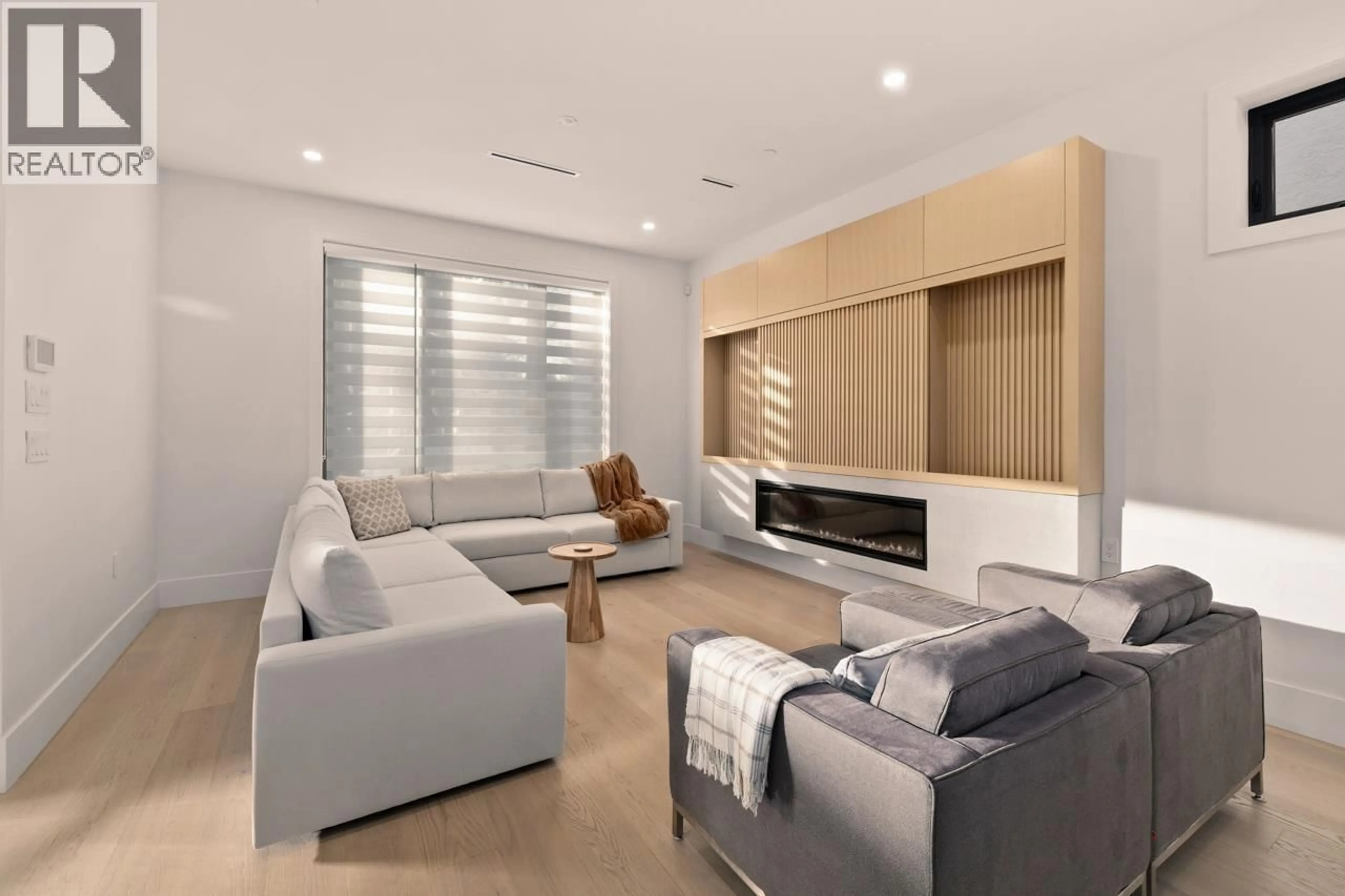 Living room with furniture, wood/laminate floor for 6408 VINE STREET, Vancouver British Columbia V6M4B1