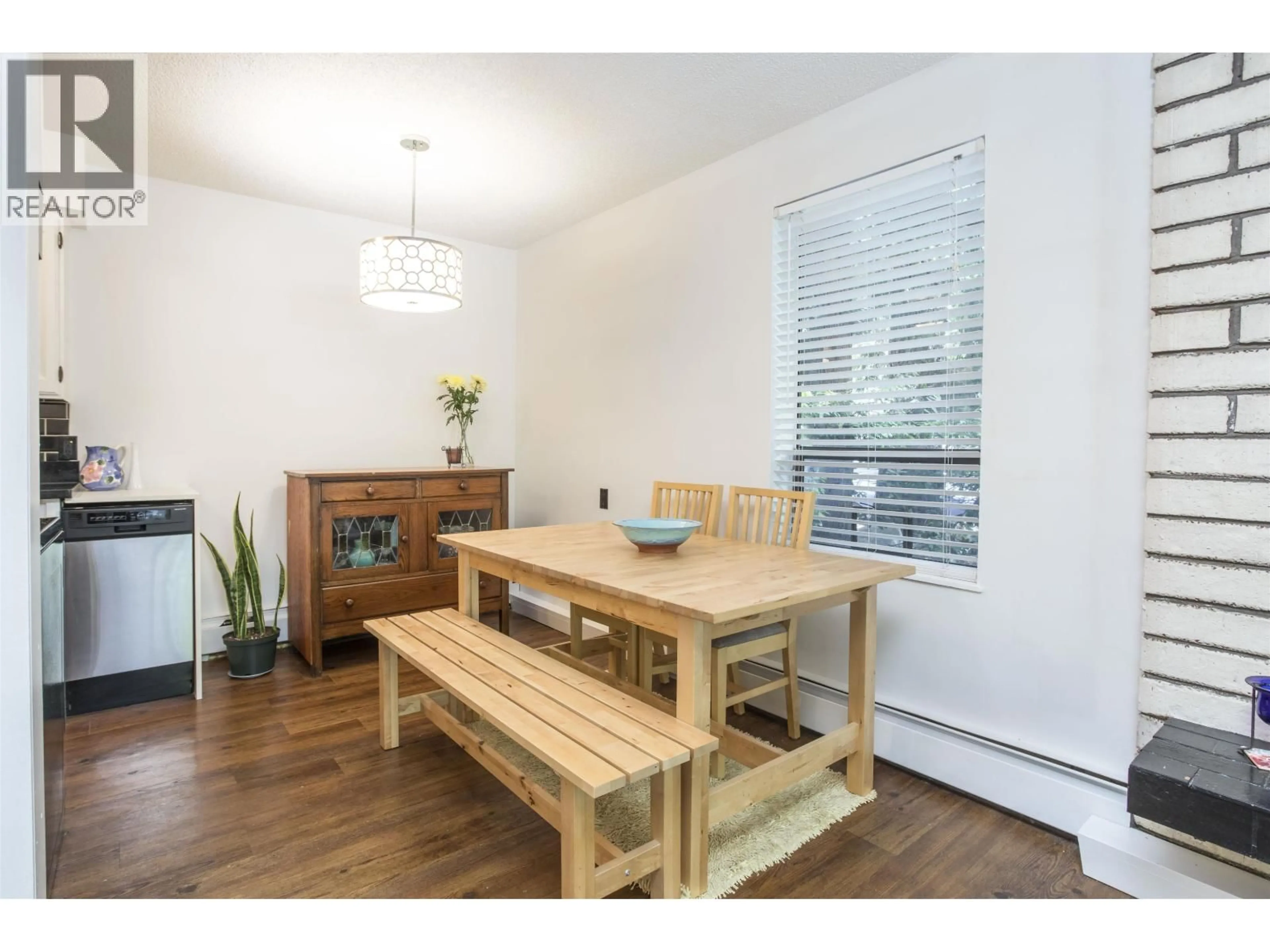 Dining room, wood/laminate floor for 102 - 1515 5TH AVENUE, Vancouver British Columbia V5N1L6