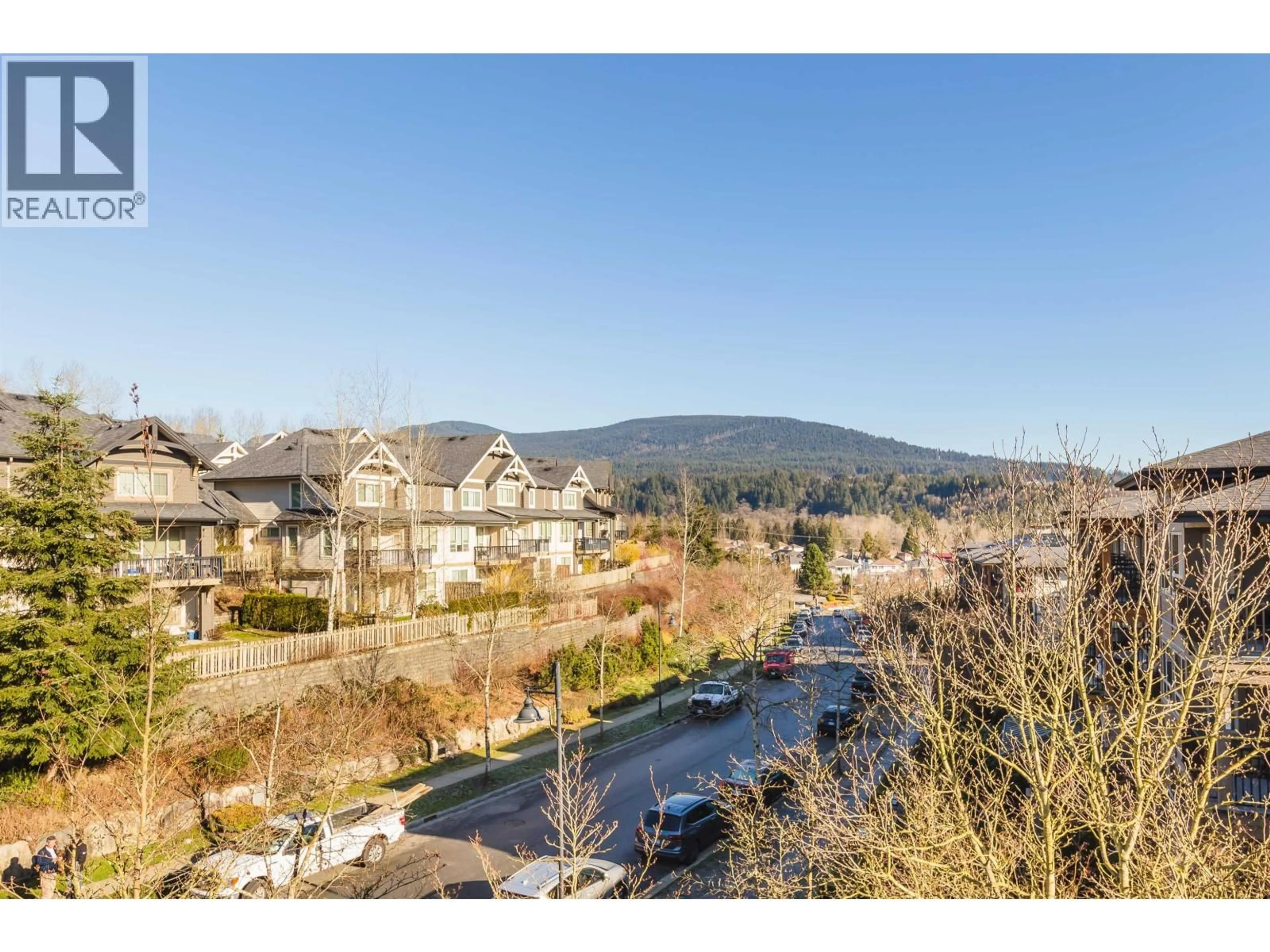 A pic from outside/outdoor area/front of a property/back of a property/a pic from drone, mountain view for 401 - 3132 DAYANEE SPRINGS BOULEVARD, Coquitlam British Columbia V3E0B5
