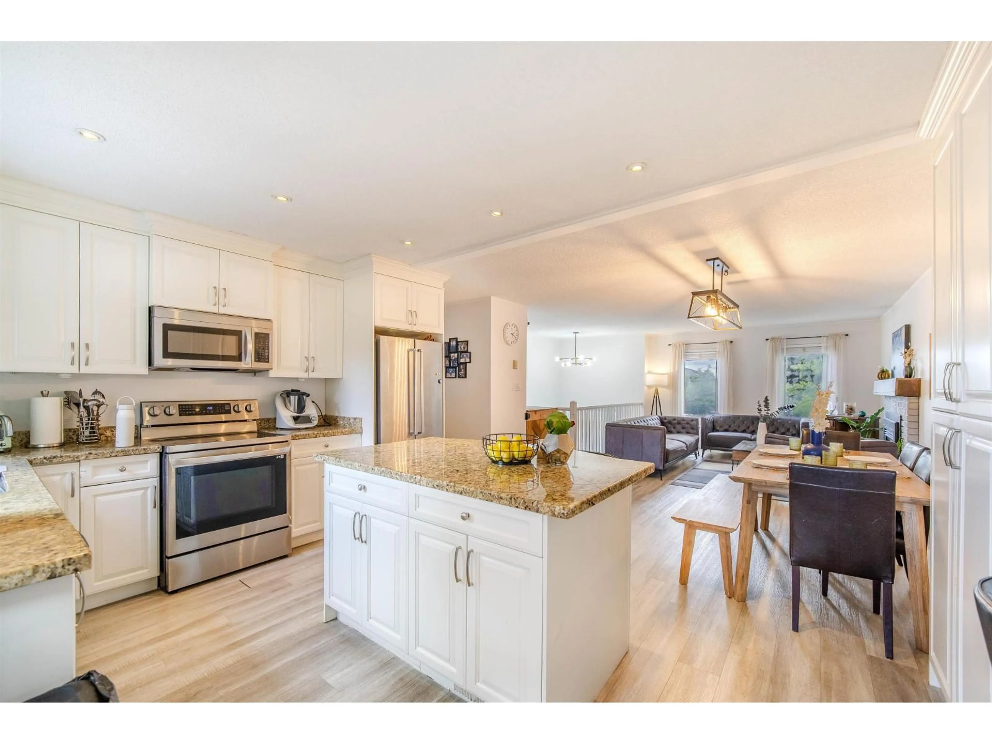Open concept kitchen, wood/laminate floor for 2659 WILDWOOD DRIVE, Langley British Columbia V2Y1G2