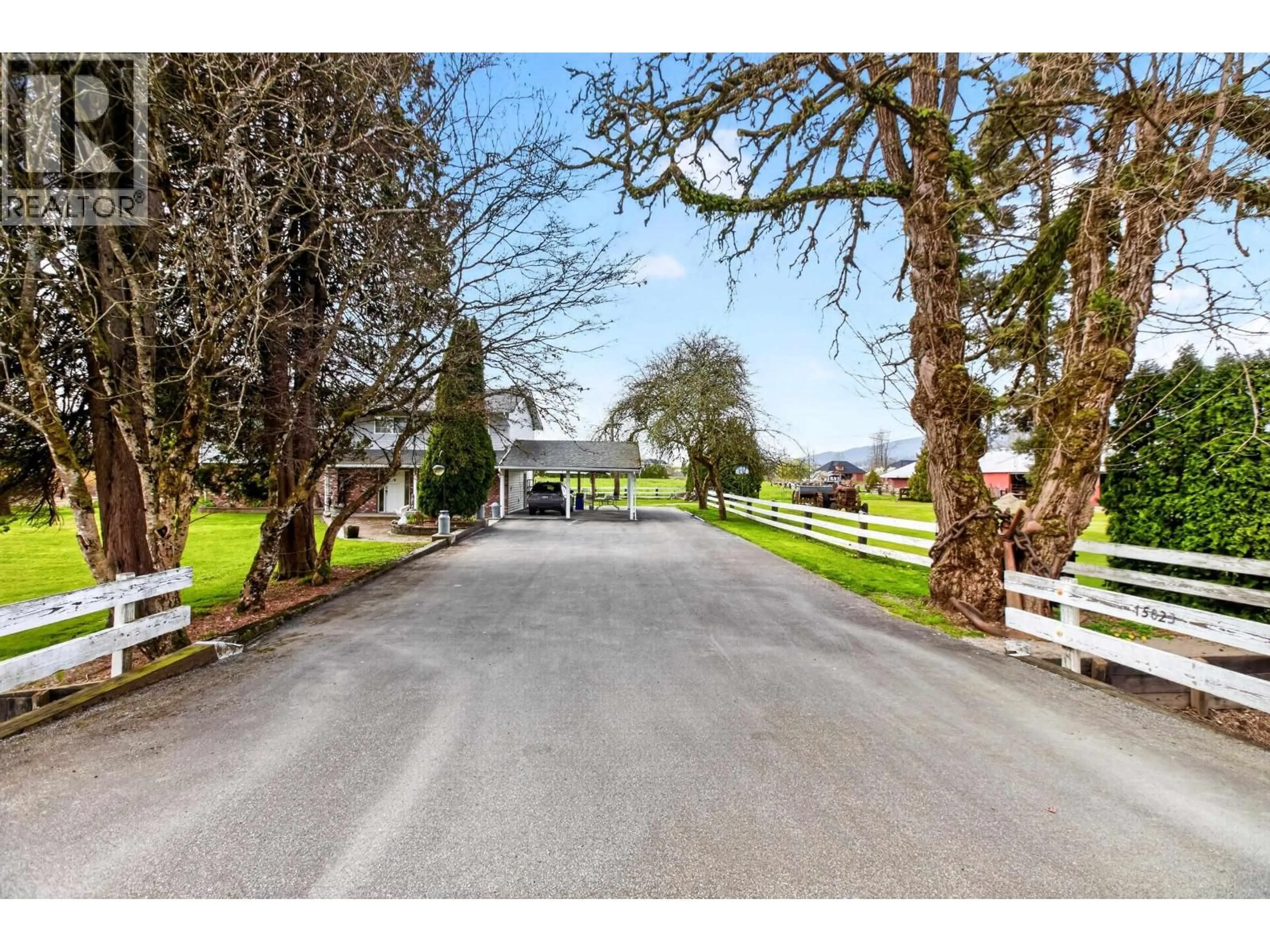 A pic from outside/outdoor area/front of a property/back of a property/a pic from drone, street for 15023 HARRIS ROAD, Pitt Meadows British Columbia V3Y1Z1