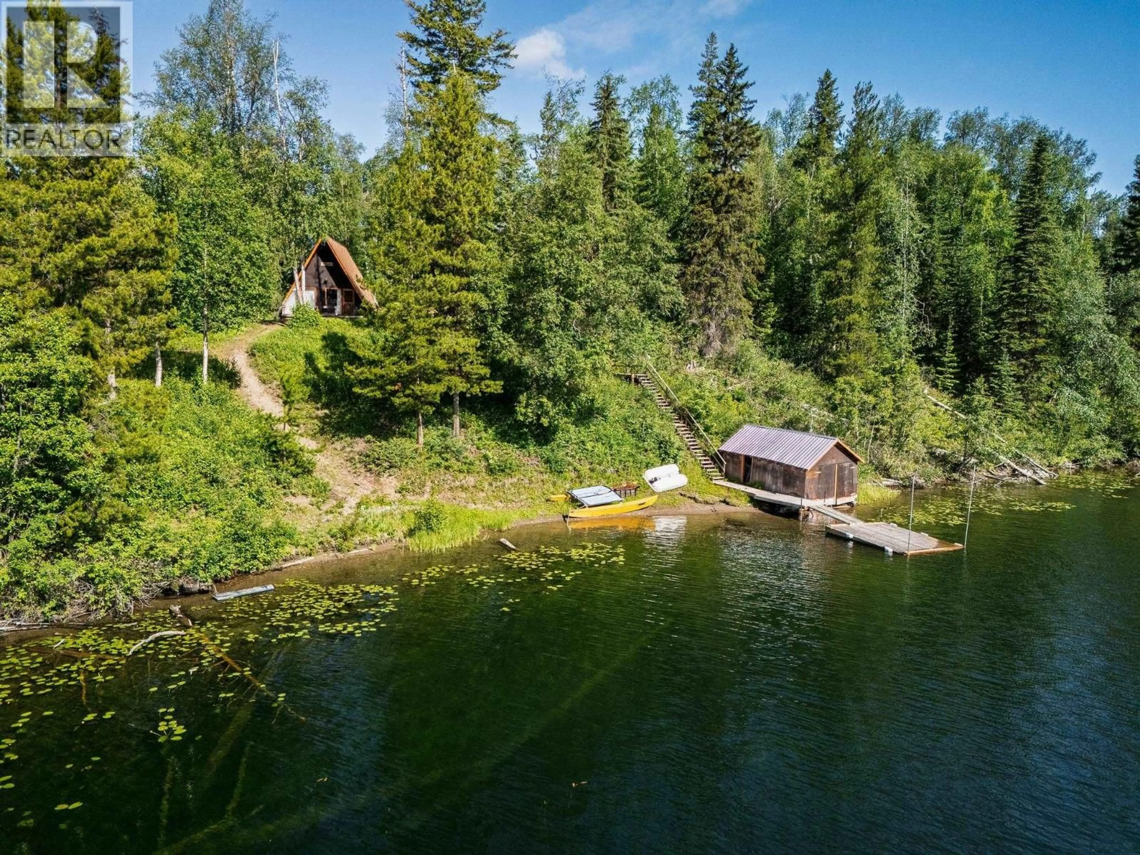 A pic from outside/outdoor area/front of a property/back of a property/a pic from drone, water/lake/river/ocean view for 25005 CAMP ROAD, Prince George British Columbia V2K5M1