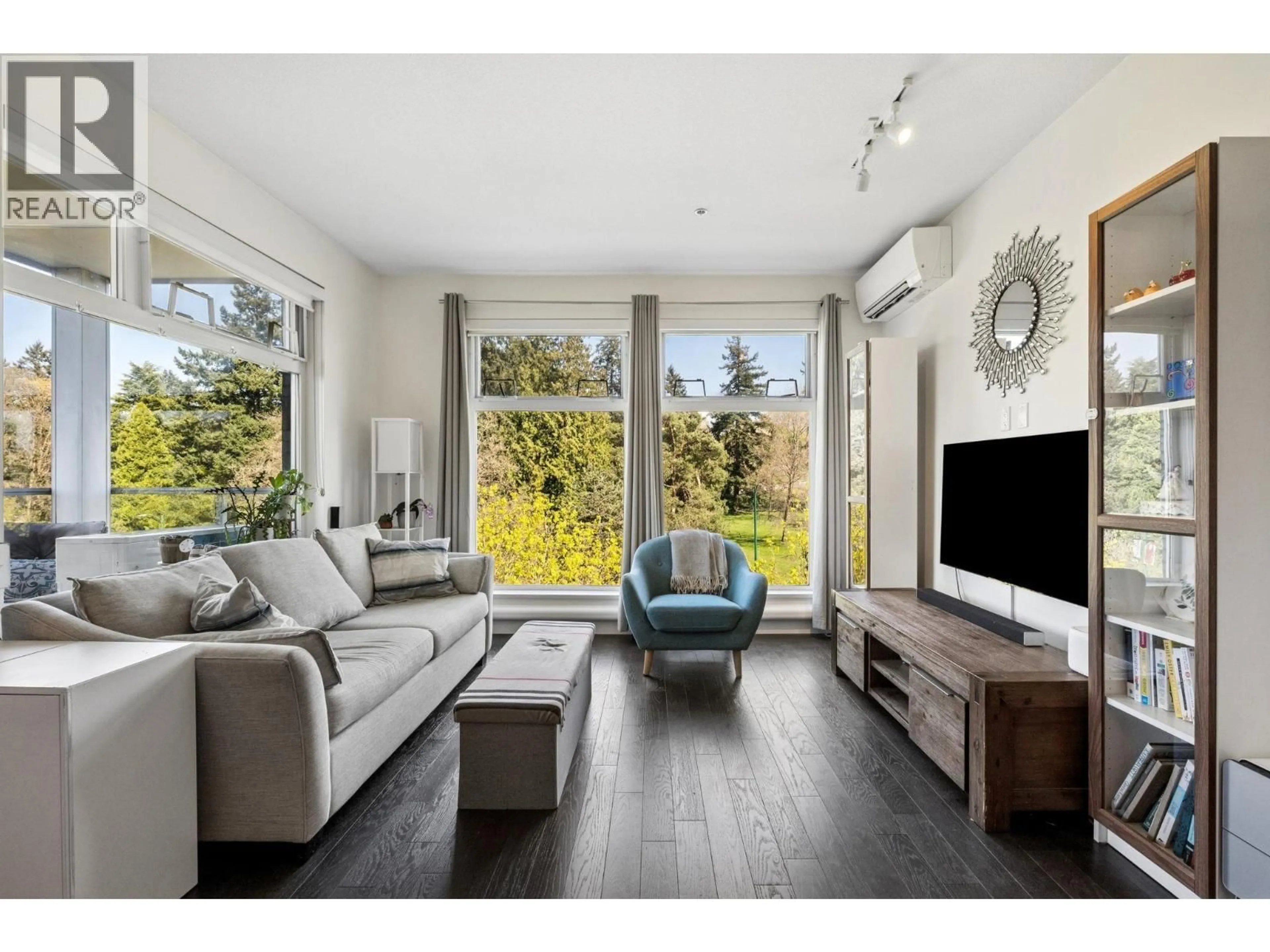 Living room with furniture, wood/laminate floor for 509 - 4867 CAMBIE STREET, Vancouver British Columbia V5Z0C5