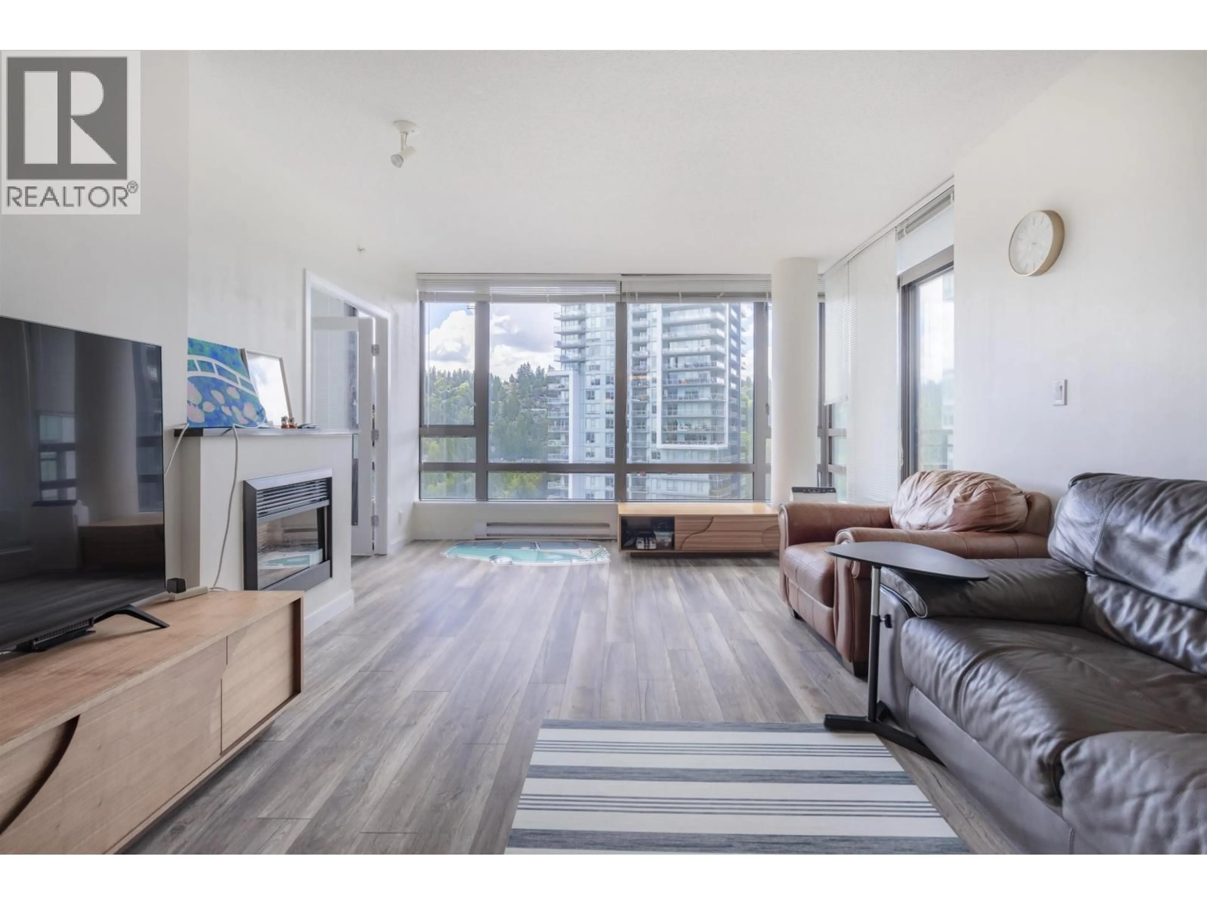 Living room with furniture, wood/laminate floor for 1503 - 400 CAPILANO ROAD, Port Moody British Columbia V3H0E1