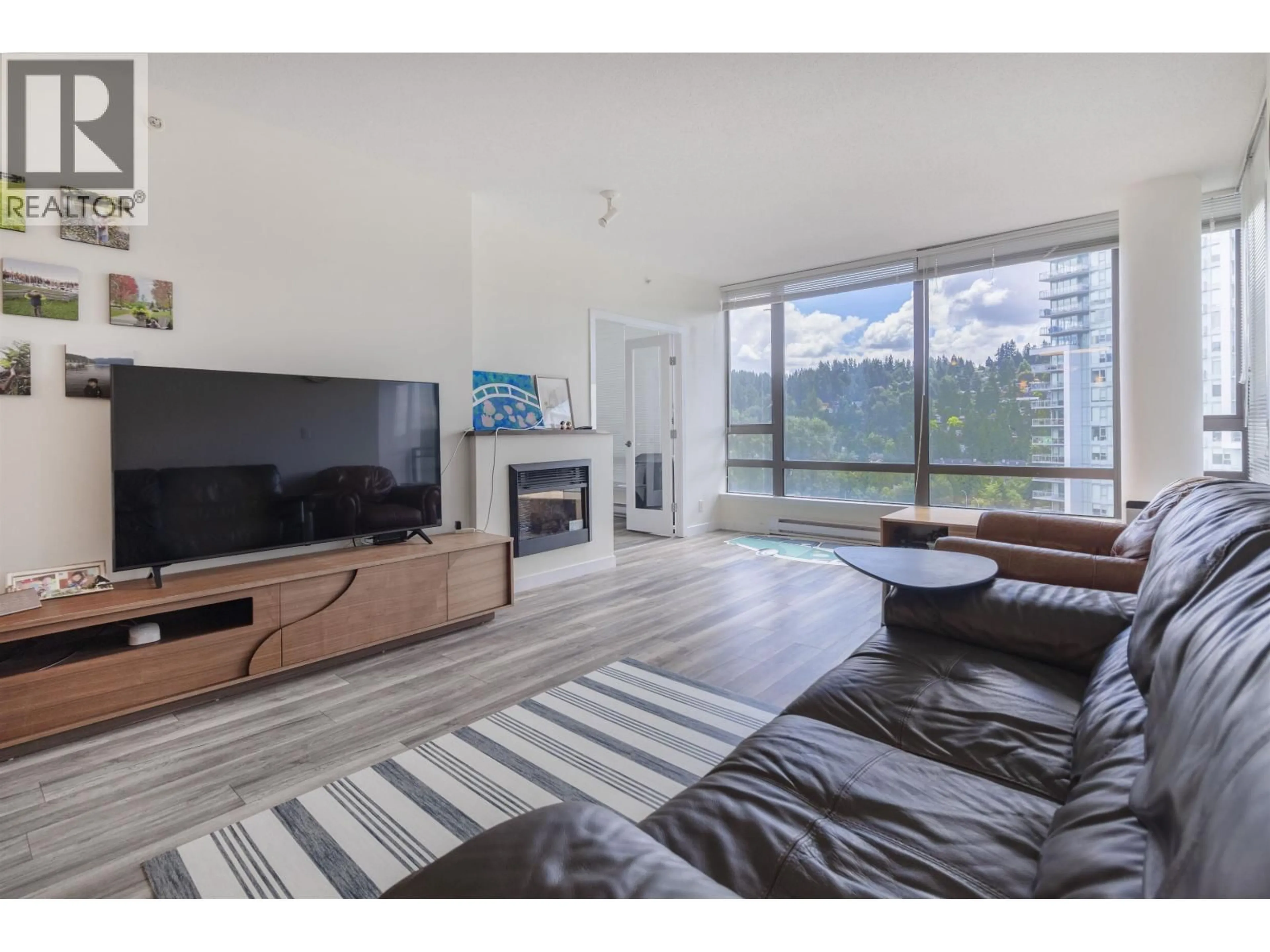 Living room with furniture, wood/laminate floor for 1503 - 400 CAPILANO ROAD, Port Moody British Columbia V3H0E1