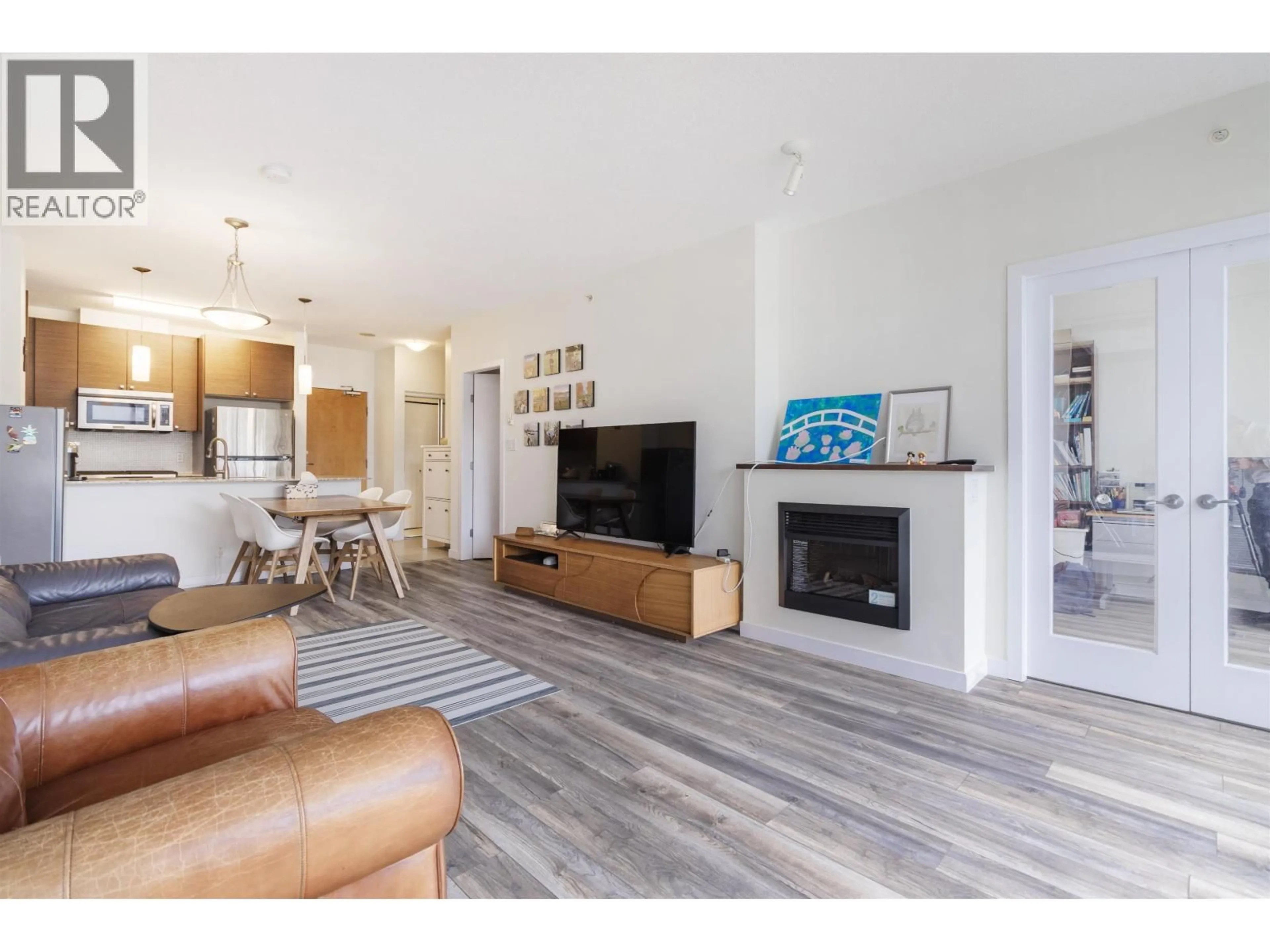 Living room with furniture, wood/laminate floor for 1503 - 400 CAPILANO ROAD, Port Moody British Columbia V3H0E1