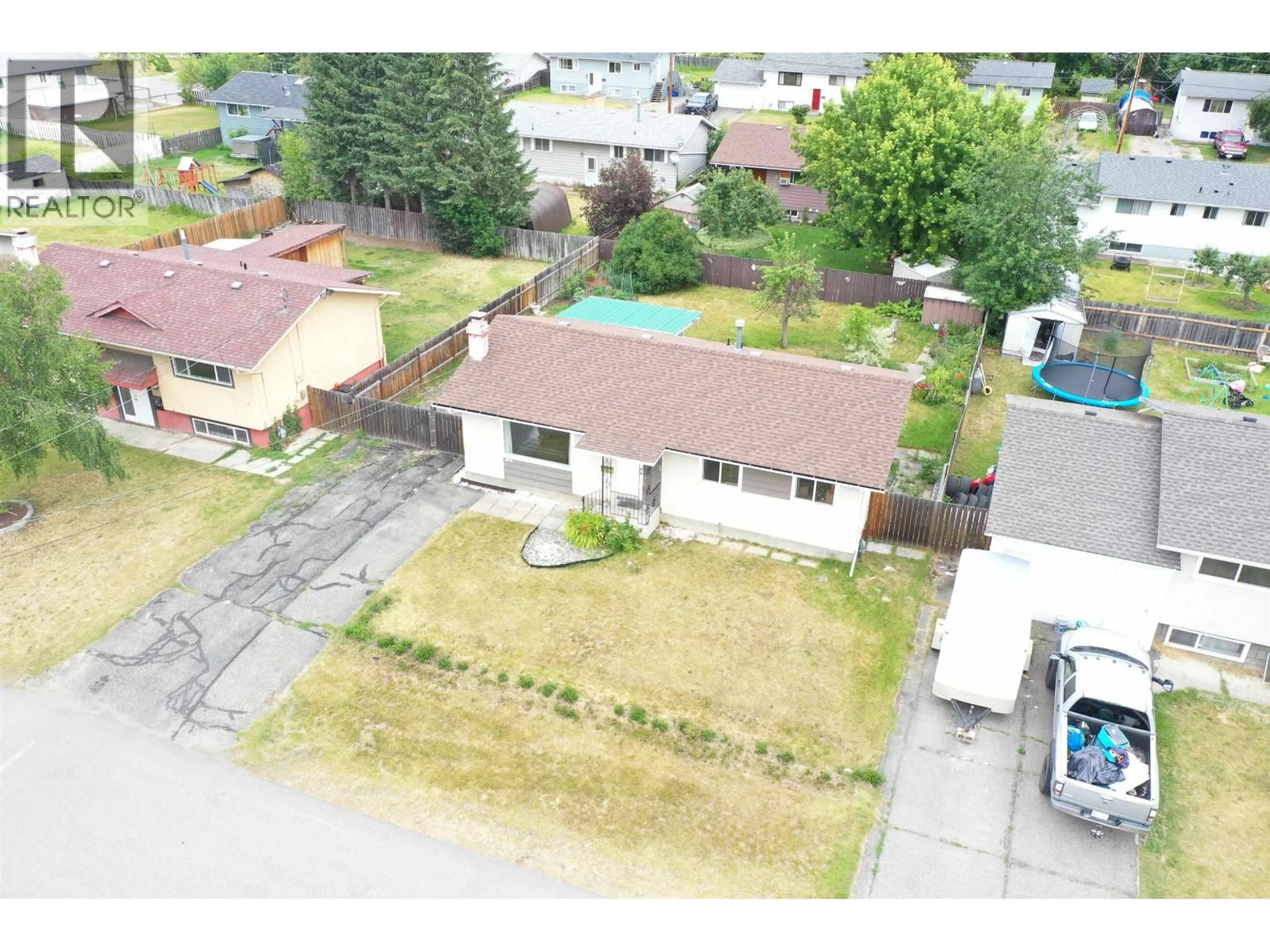 A pic from outside/outdoor area/front of a property/back of a property/a pic from drone, street for 465 ROBERTSON AVENUE, Quesnel British Columbia V2J3L3