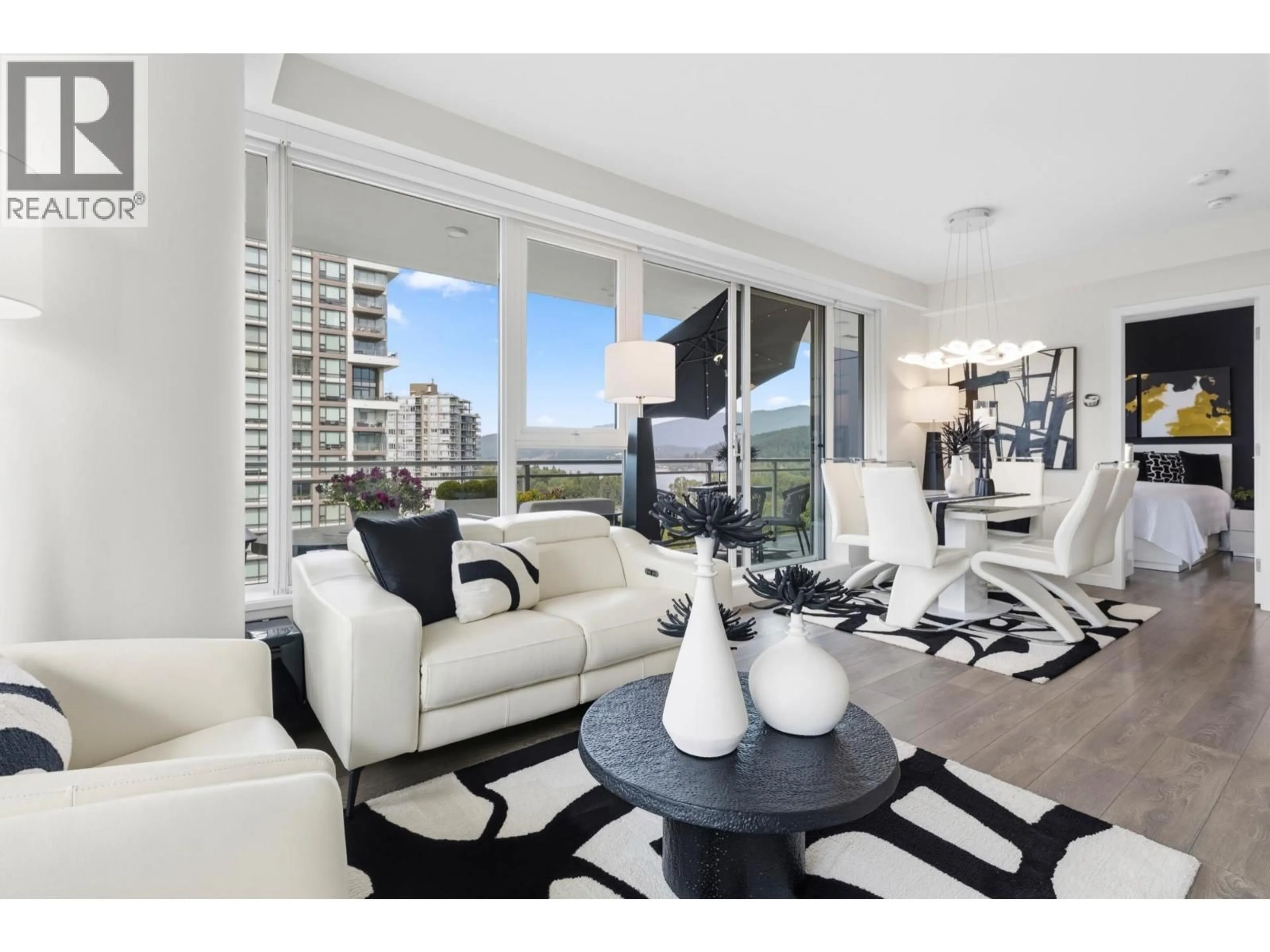 Living room with furniture, unknown for 1607 - 305 MORRISSEY ROAD, Port Moody British Columbia V3H0M3