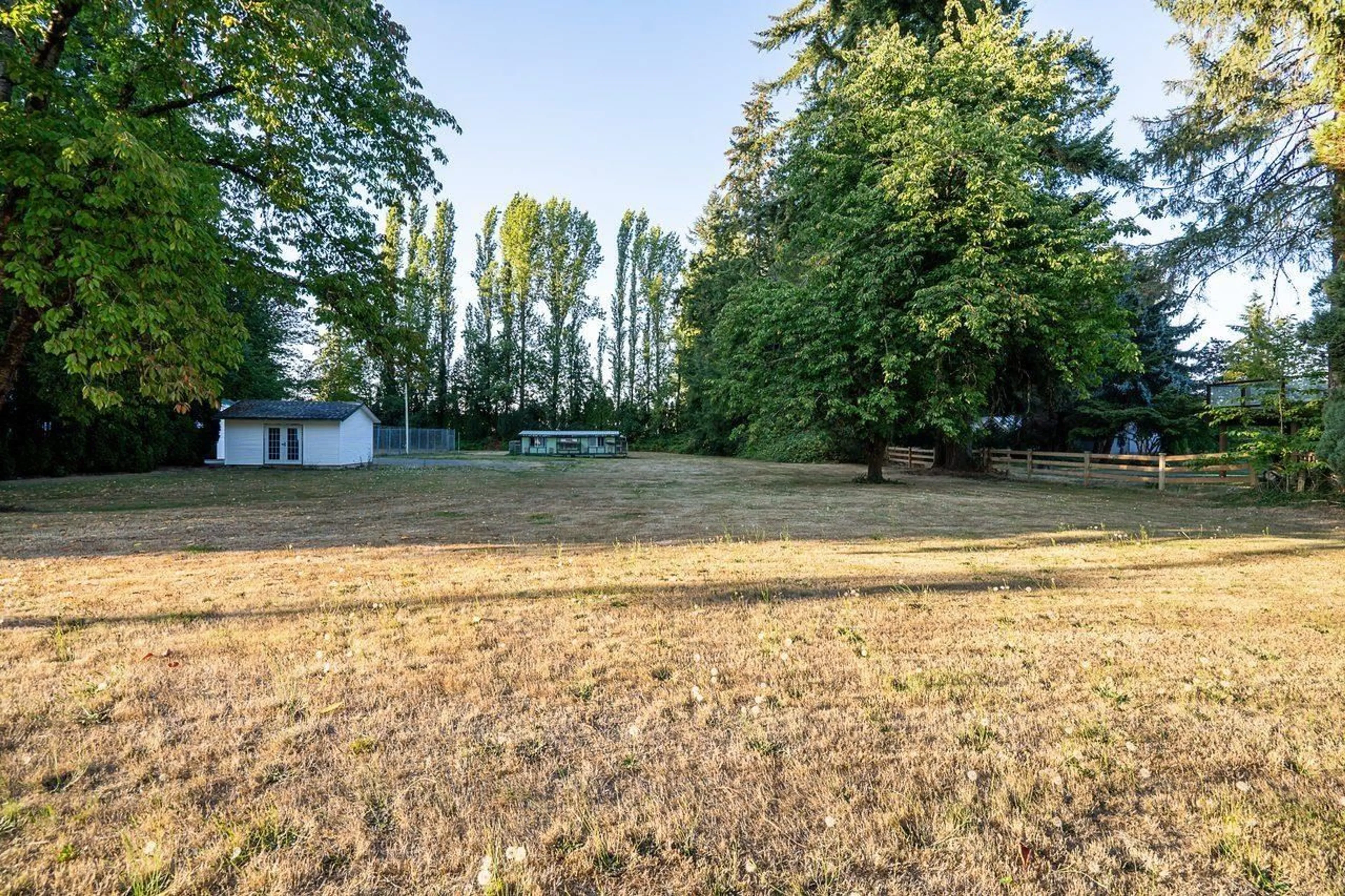 A pic from outside/outdoor area/front of a property/back of a property/a pic from drone, forest/trees view for 23523 47 AVENUE, Langley British Columbia V2Z2S3