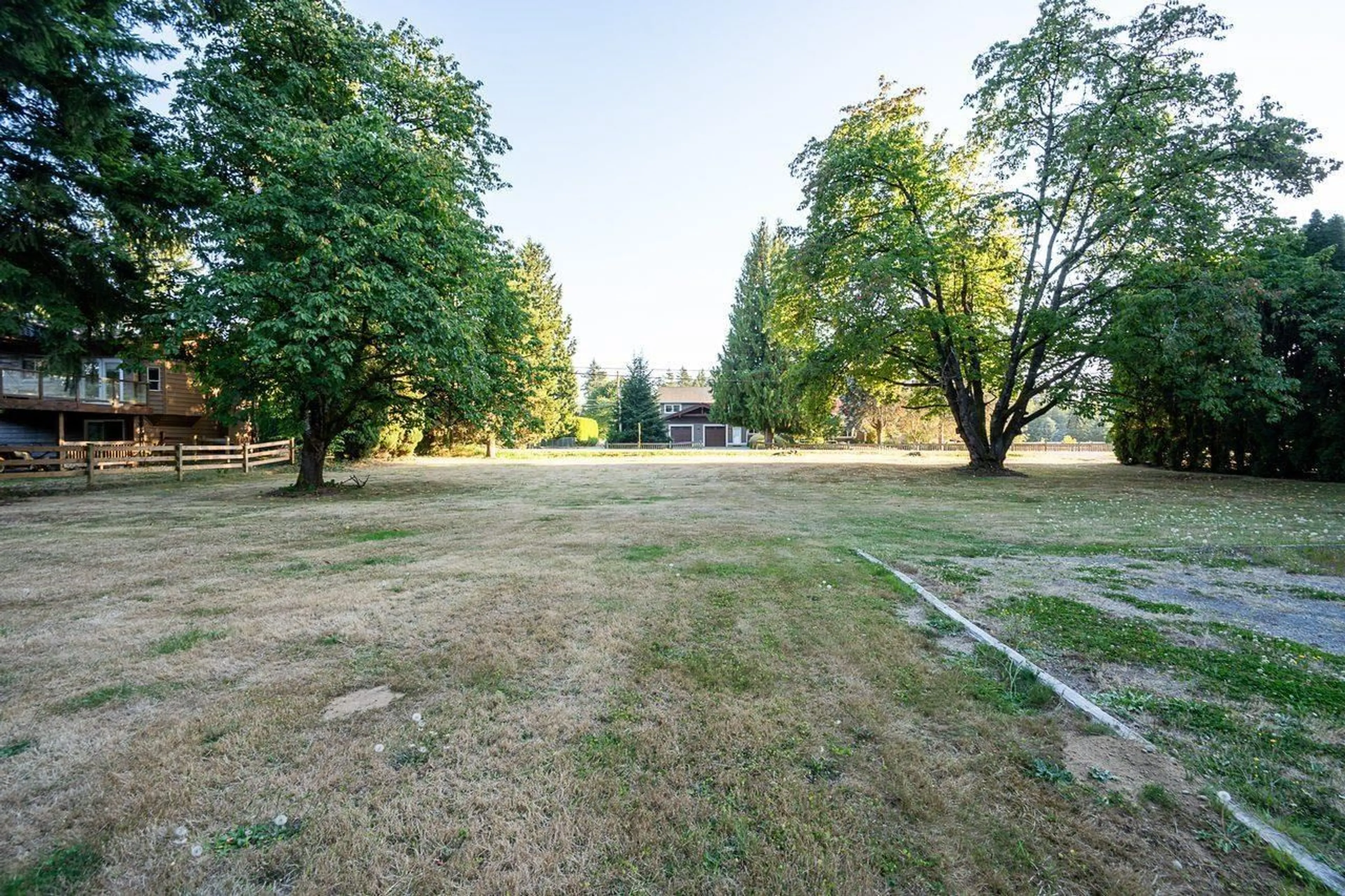 A pic from outside/outdoor area/front of a property/back of a property/a pic from drone, forest/trees view for 23523 47 AVENUE, Langley British Columbia V2Z2S3