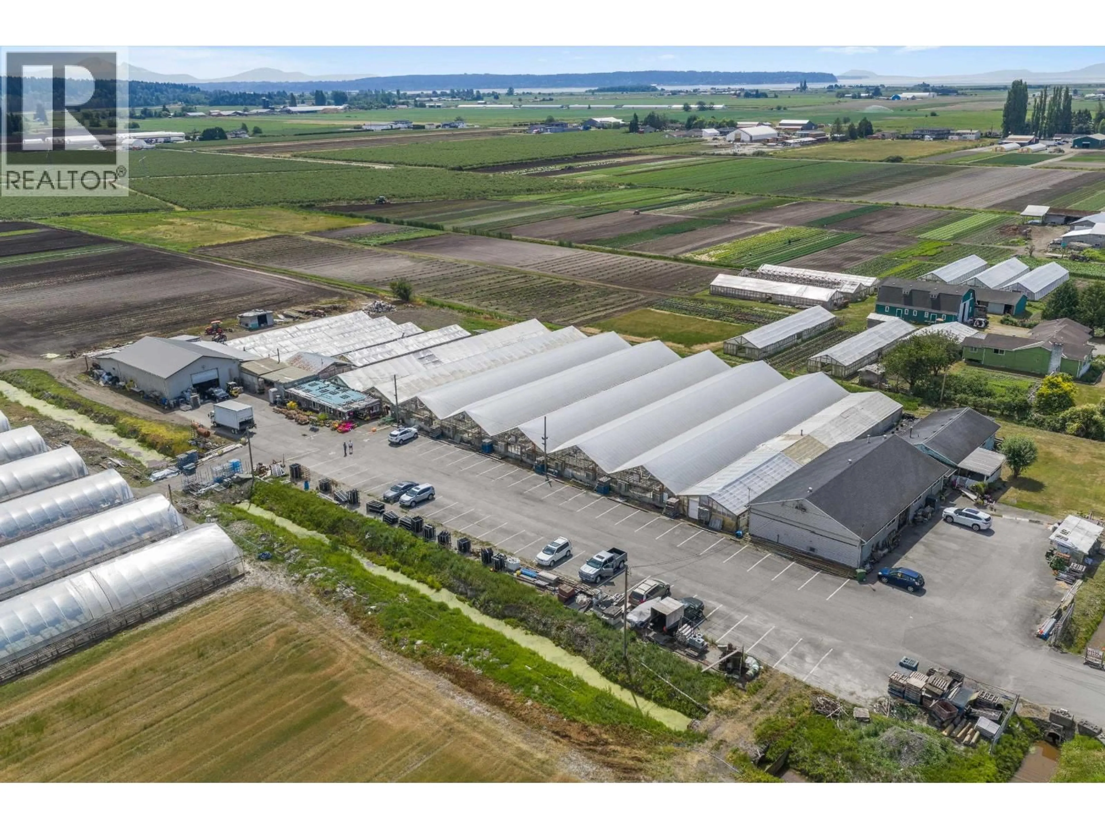 A pic from outside/outdoor area/front of a property/back of a property/a pic from drone, building for 6210 104 STREET, Delta British Columbia V4K3N3
