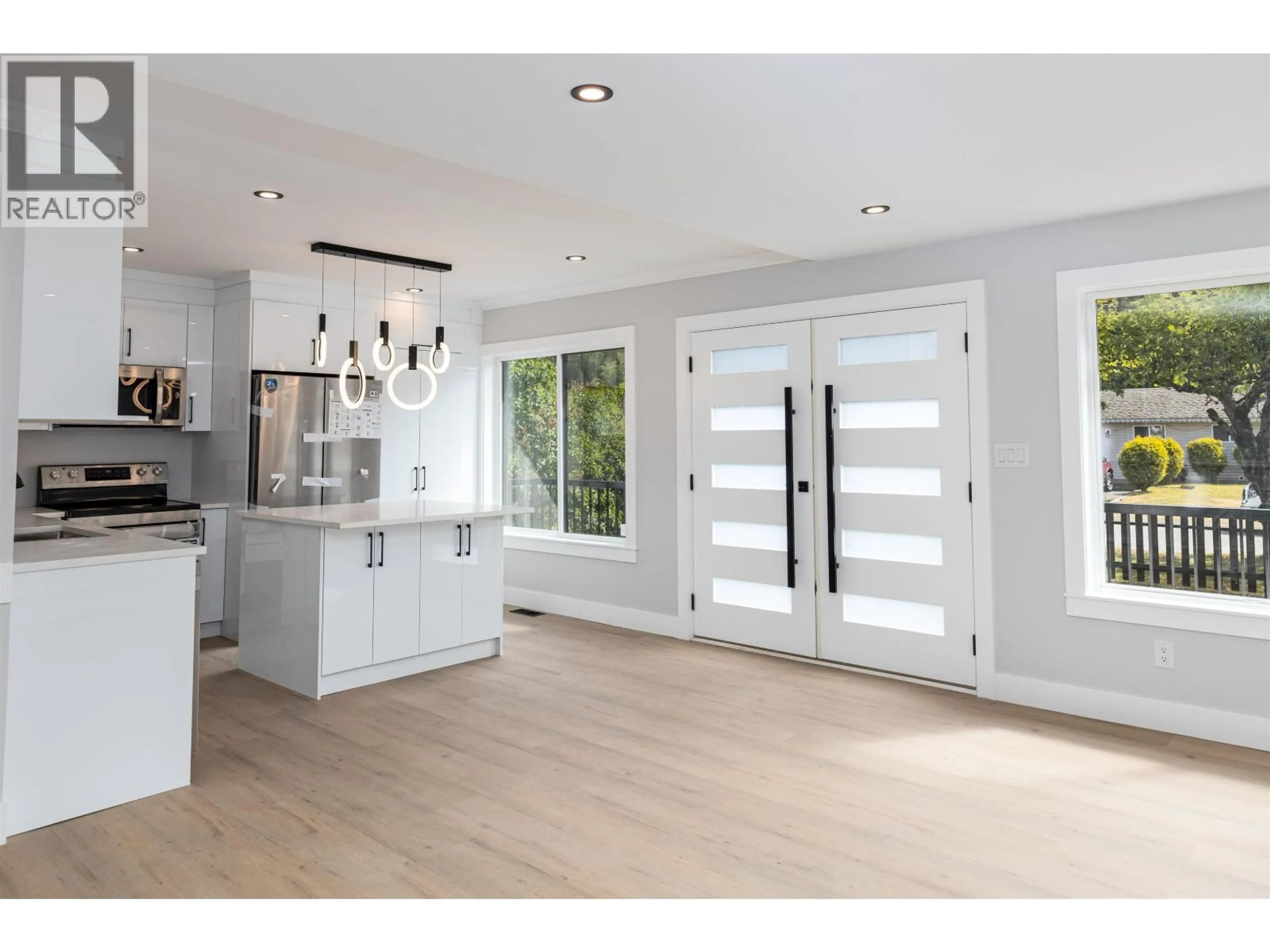 Open concept kitchen, wood/laminate floor for 2711 SPARKS STREET, Terrace British Columbia V8G2T4