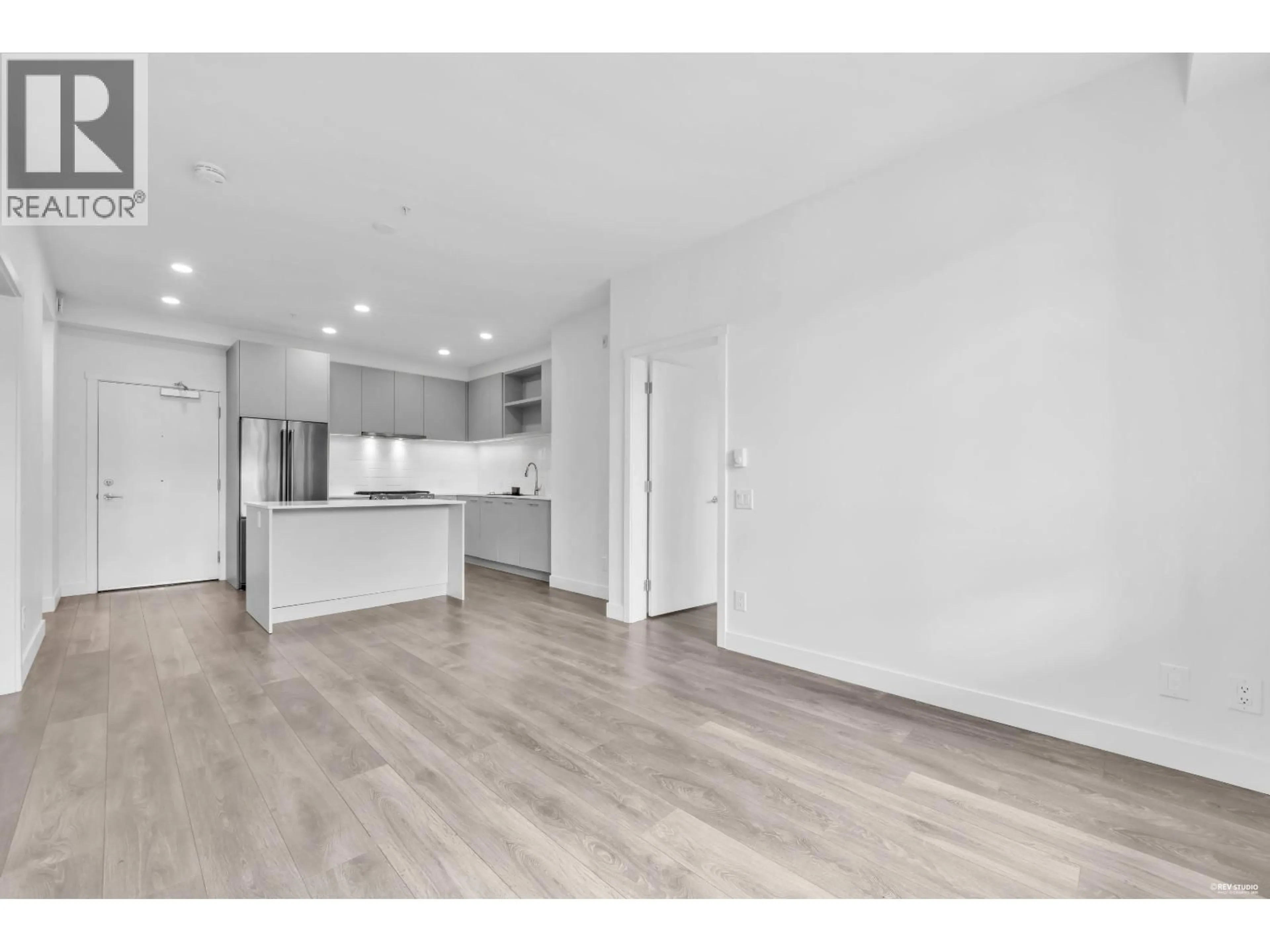 Open concept kitchen, wood/laminate floor for 213 - 735 ANSKAR COURT, Coquitlam British Columbia V3J0L7