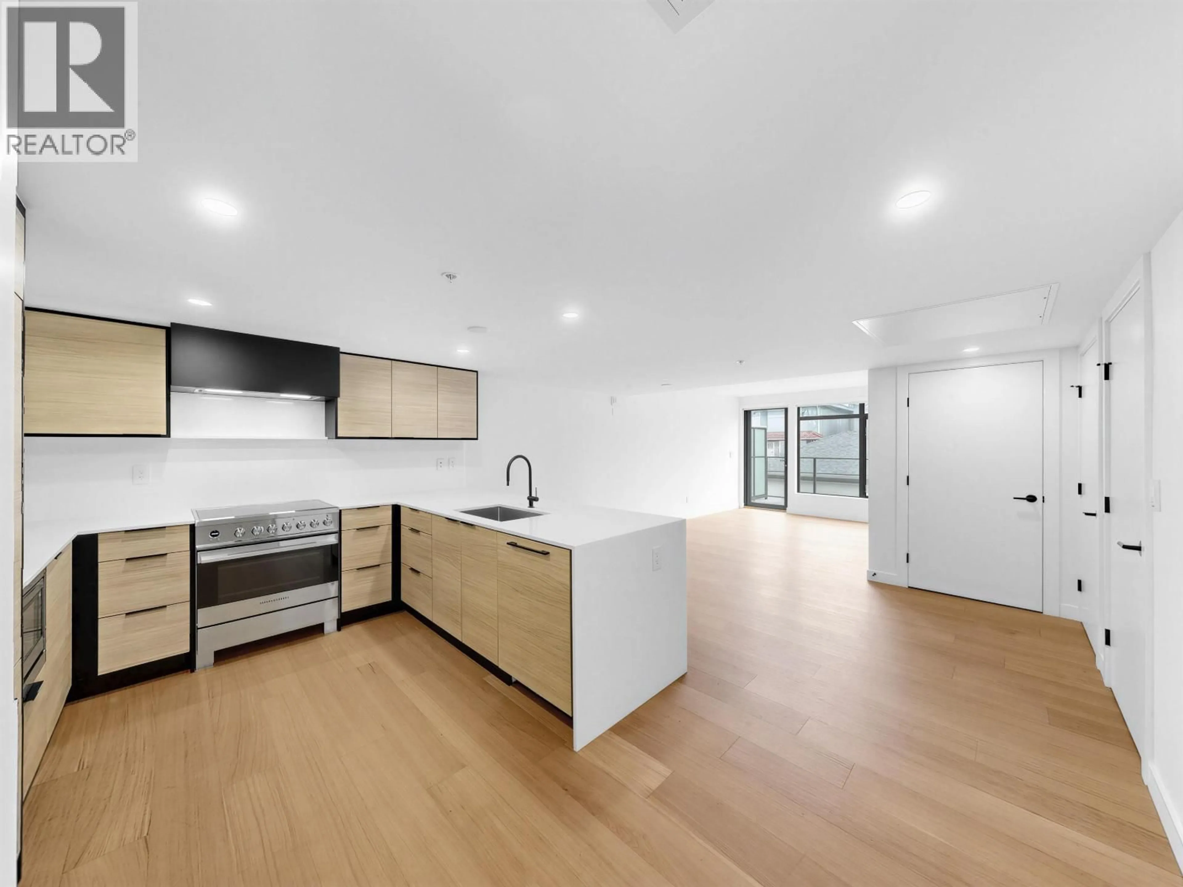 Open concept kitchen, unknown for 202 - 6485 MANITOBA STREET, Vancouver British Columbia V5Y0P7