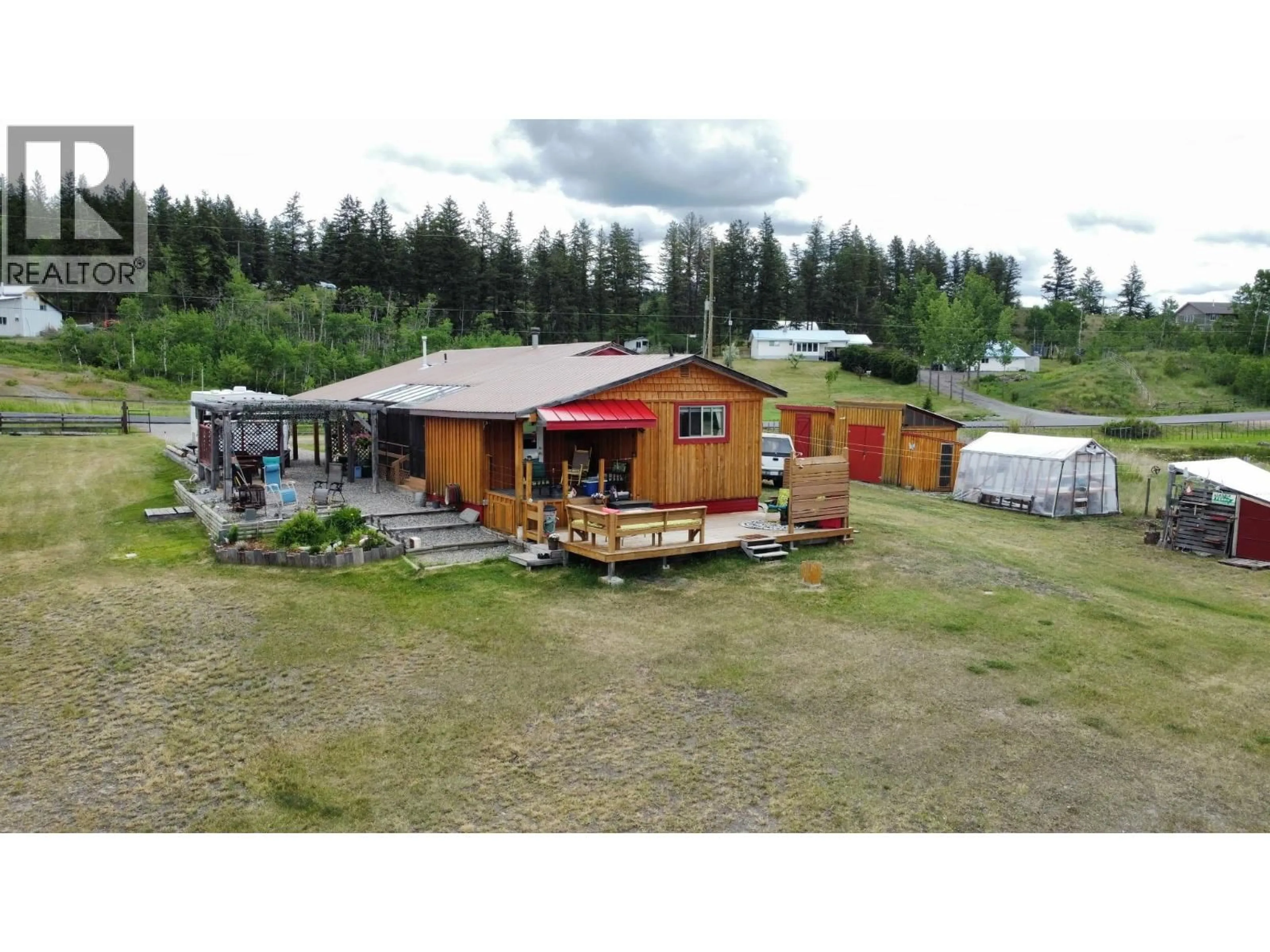 A pic from outside/outdoor area/front of a property/back of a property/a pic from drone, unknown for 2977 AMARILLO ROAD, 150 Mile House British Columbia V0K2G0