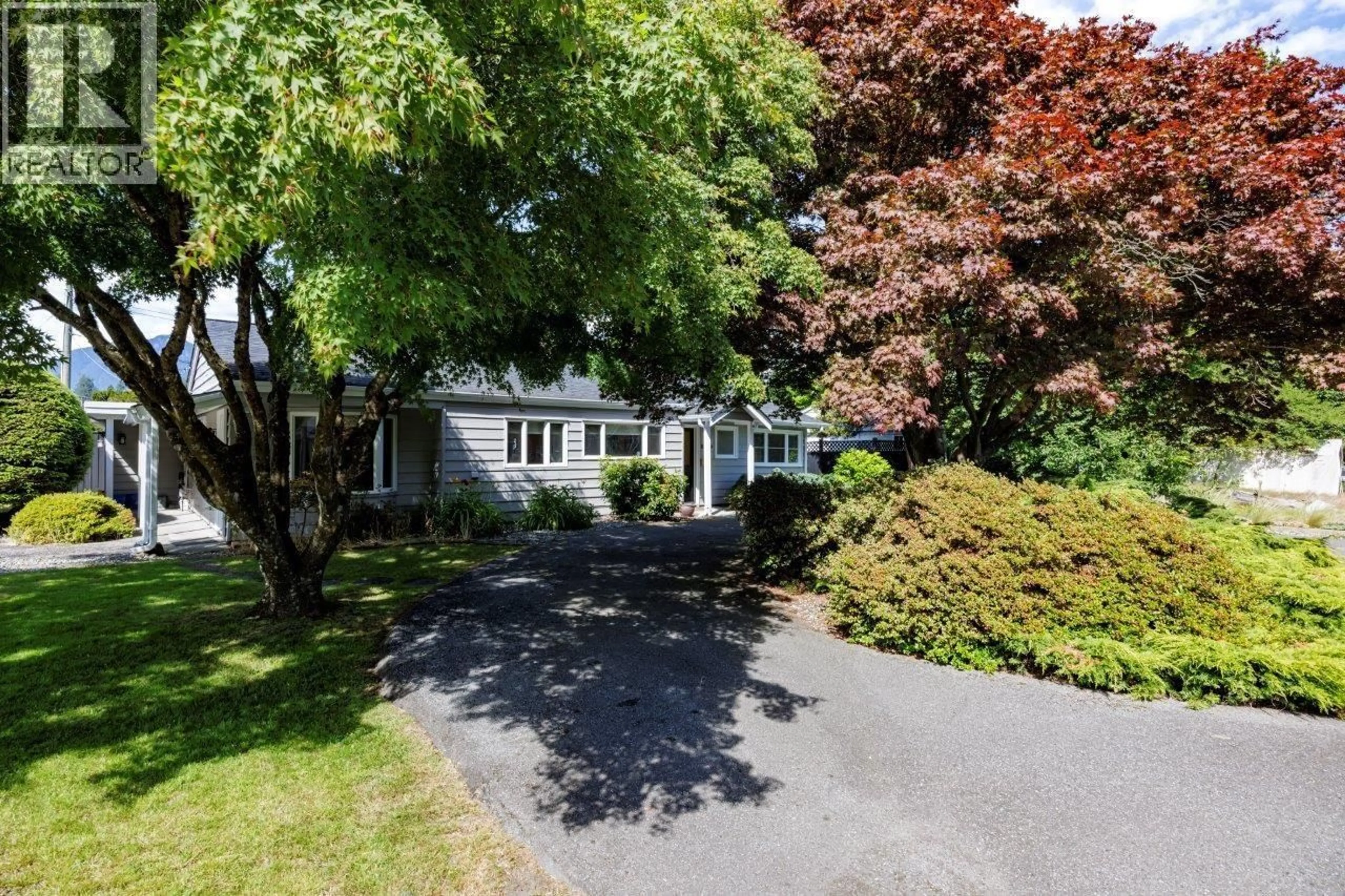 A pic from outside/outdoor area/front of a property/back of a property/a pic from drone, street for 1140 PINEWOOD CRESCENT, North Vancouver British Columbia V7P1E8