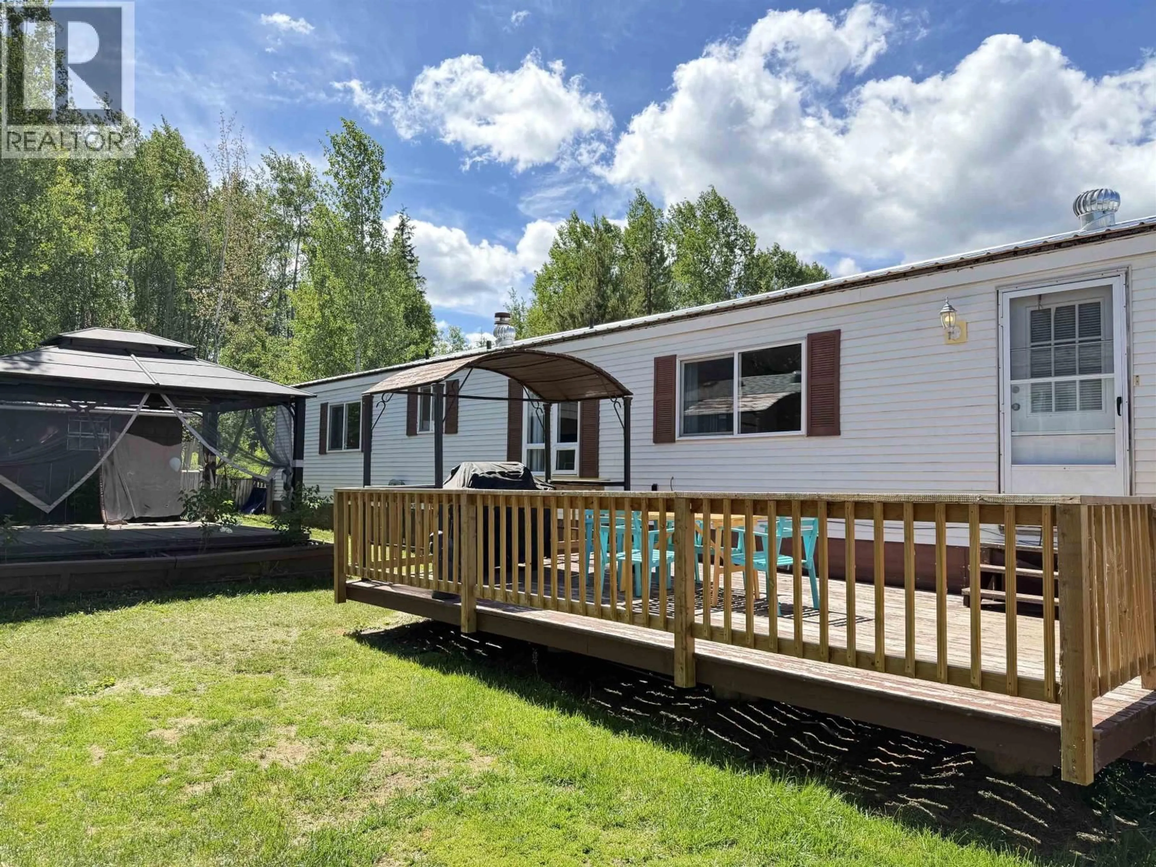 A pic from outside/outdoor area/front of a property/back of a property/a pic from drone, unknown for 78 - 95 LAIDLAW ROAD, Smithers British Columbia V0J2N6