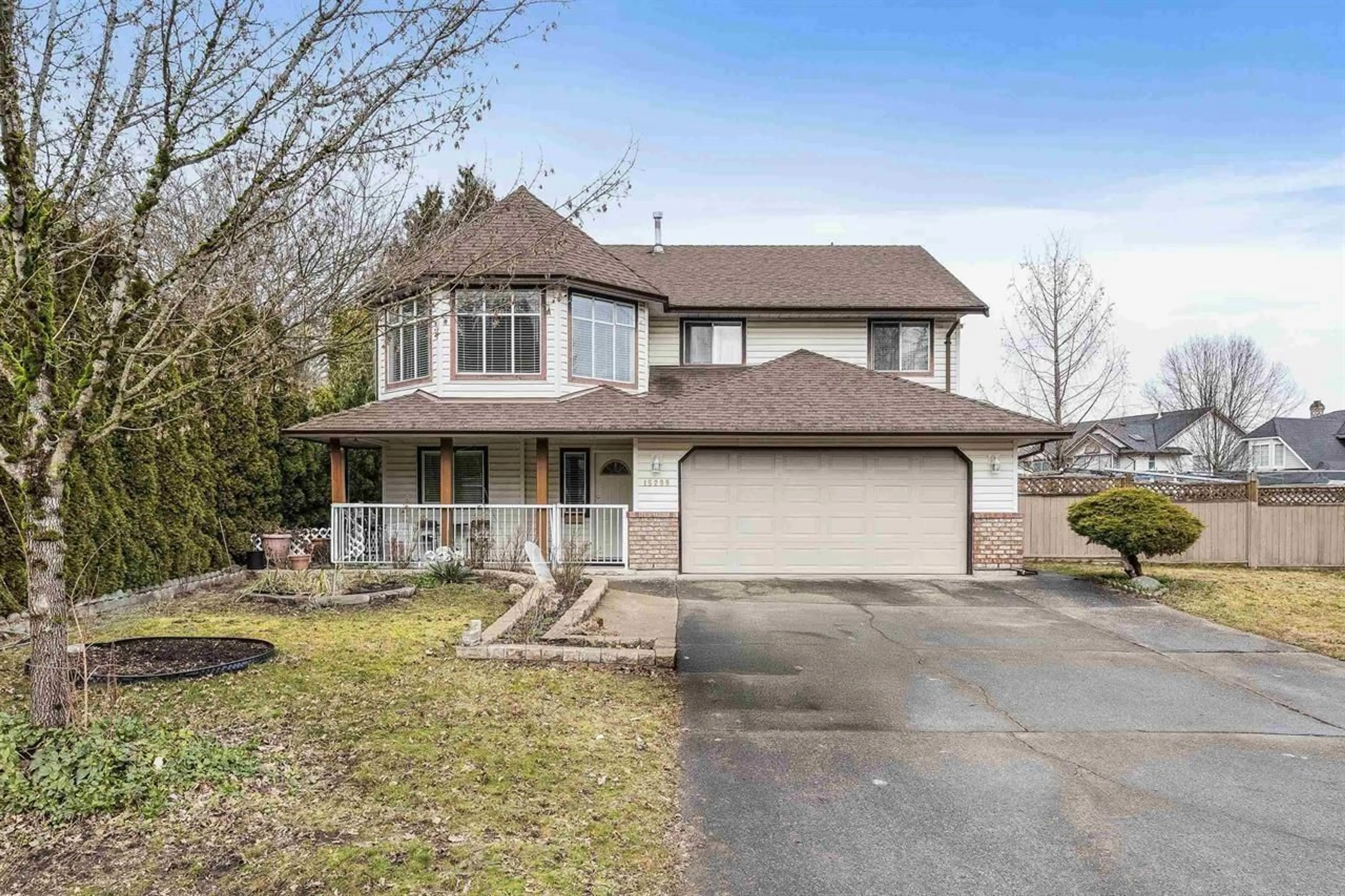 Home with vinyl exterior material, street for 15299 93A AVENUE, Surrey British Columbia V3R0E6