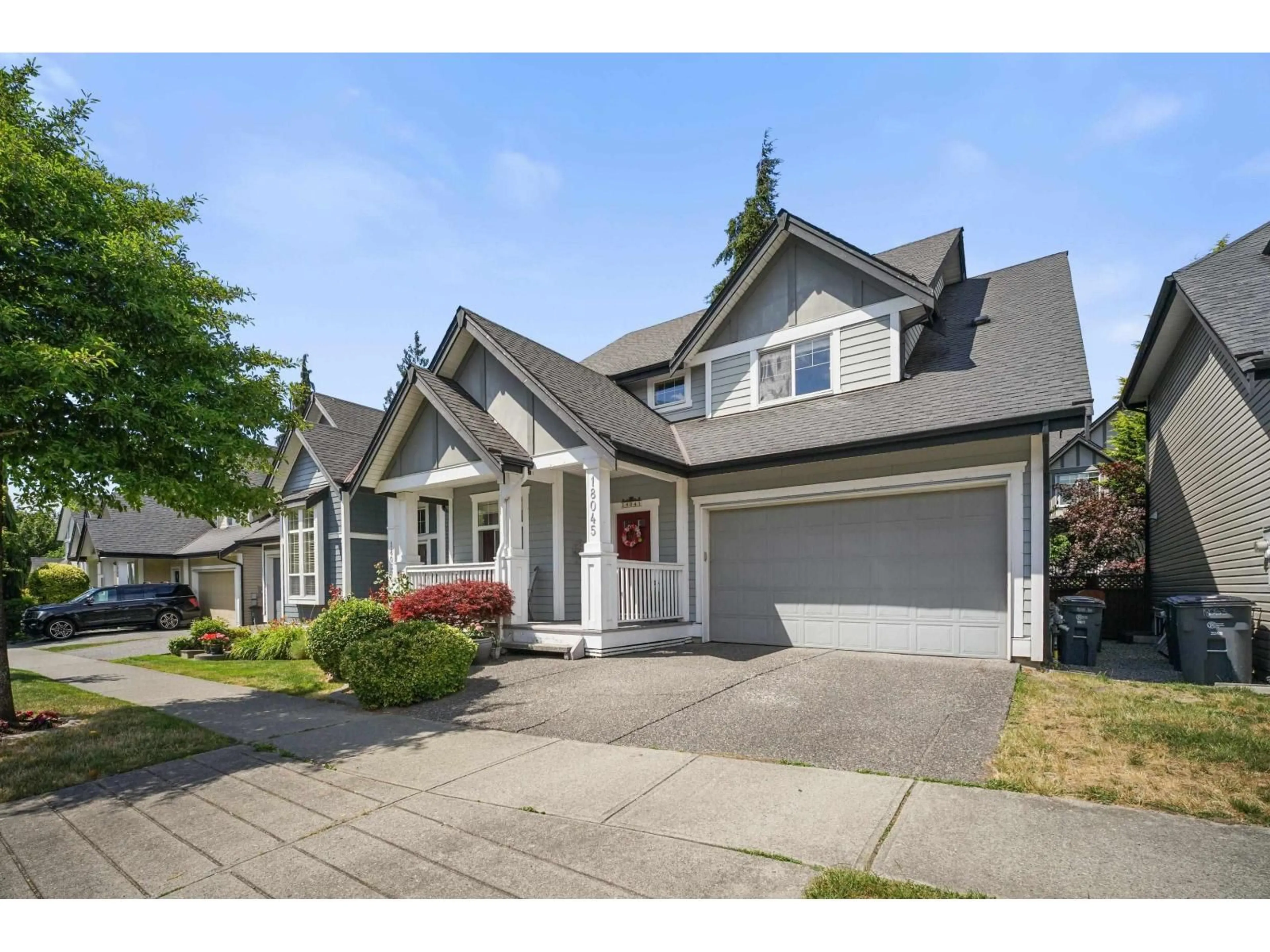 Home with vinyl exterior material, street for 18045 70A AVENUE, Surrey British Columbia V3S7C5