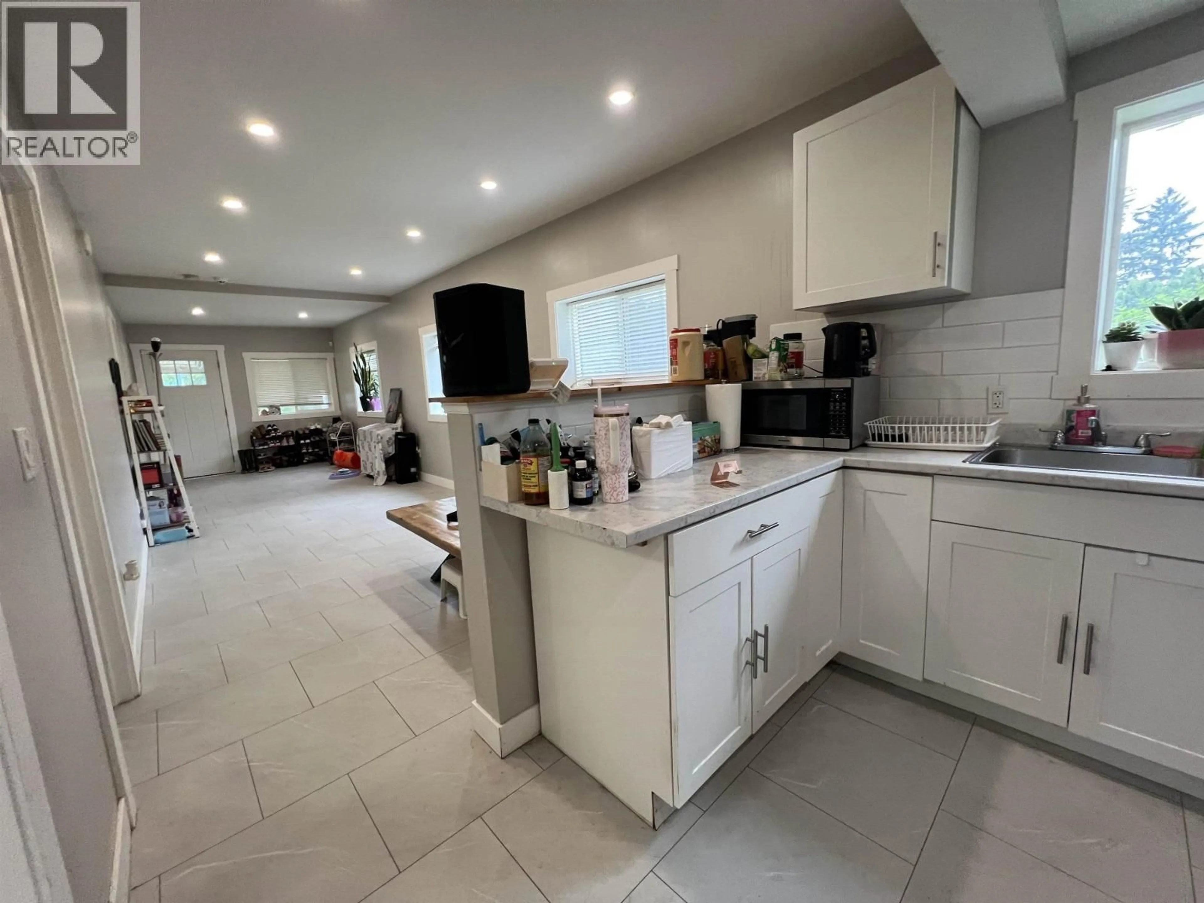 Open concept kitchen, ceramic/tile floor for 219 9 AVENUE, Prince Rupert British Columbia V8J2R8